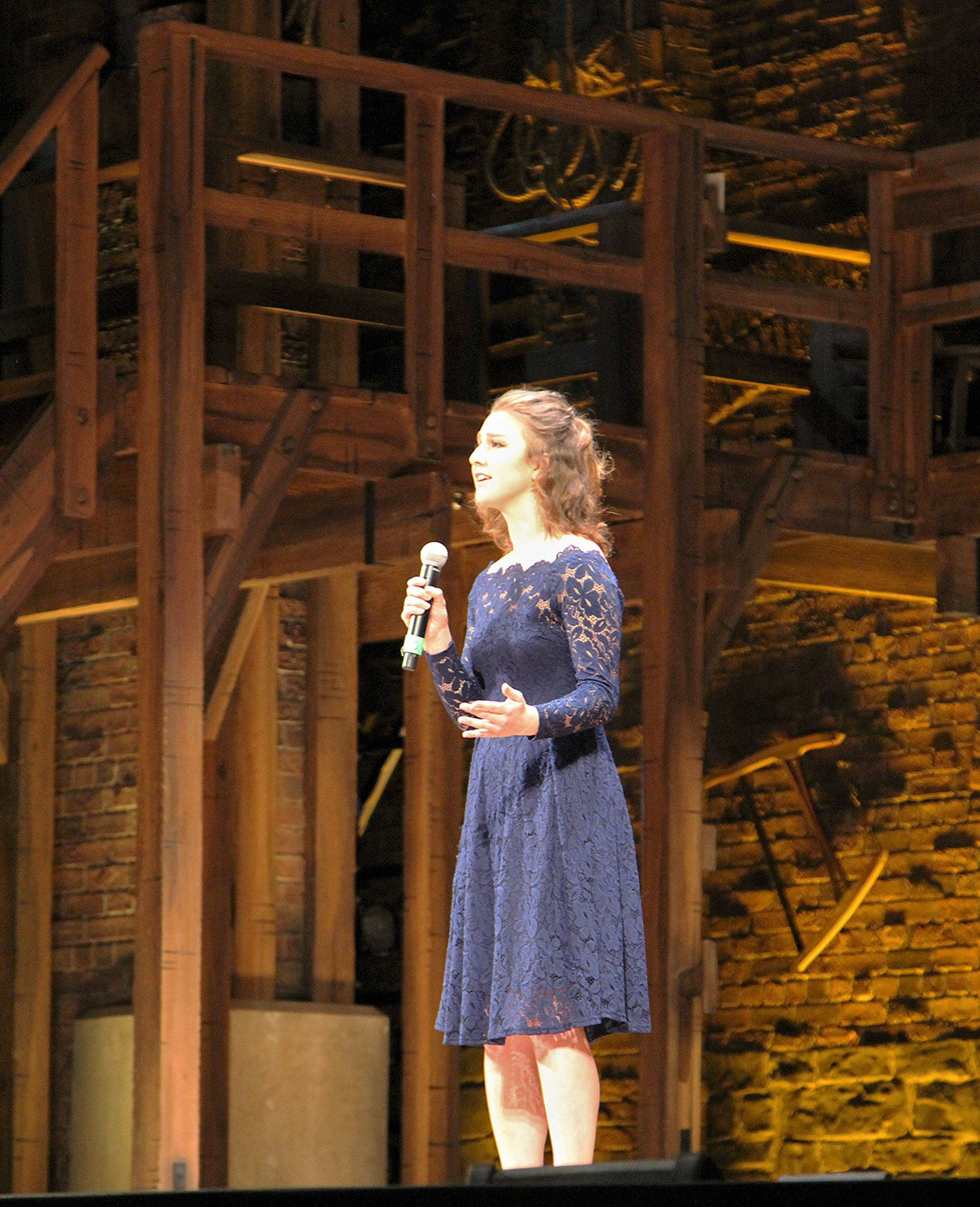 (Courtesy Kariana Aldrich) North River School sophomore Georgia Clark sings “A letter from Aaron Burr to Alexander Hamilton” at the Paramount Theatre in Seattle.