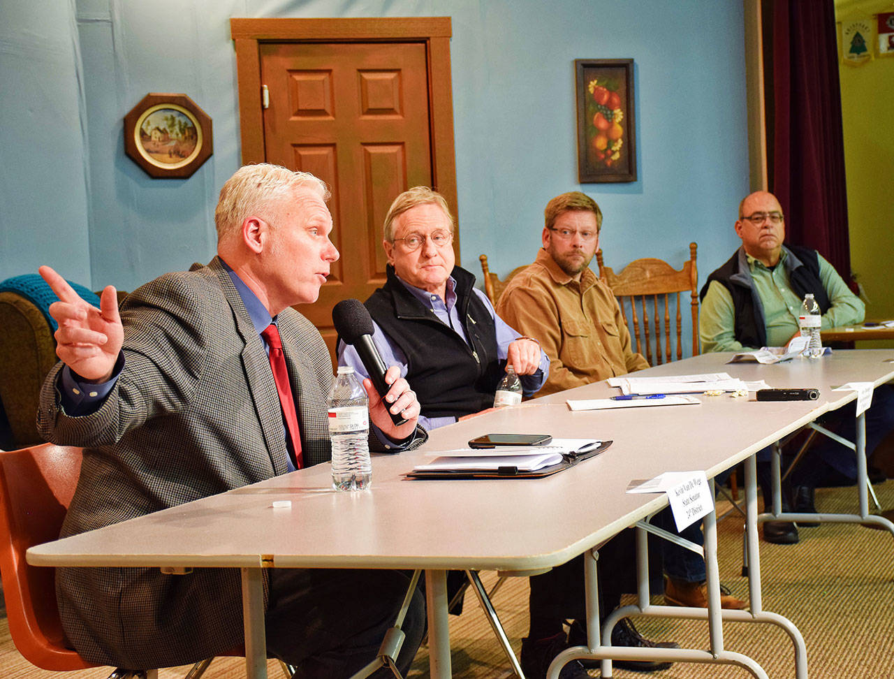 24th District legislators (L-R) Sen. Kevin Van De Wege, Rep. Steve Tharinger, and Rep. Mike Chapman, answer questions from North Beach News editor Angelo Bruscas and members of the Ocean Shores Town Hall on March 22.