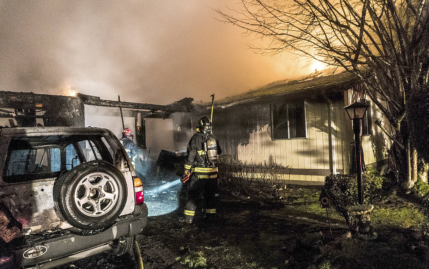 GRAYS HARBOR FIRE DISTRICT #5 PHOTO                                A home, motorhome and passenger vehicle were destroyed by fire early Thursday morning in the 100 block of Heritage Drive in Elma. The residents and pets were able to escape without injury.