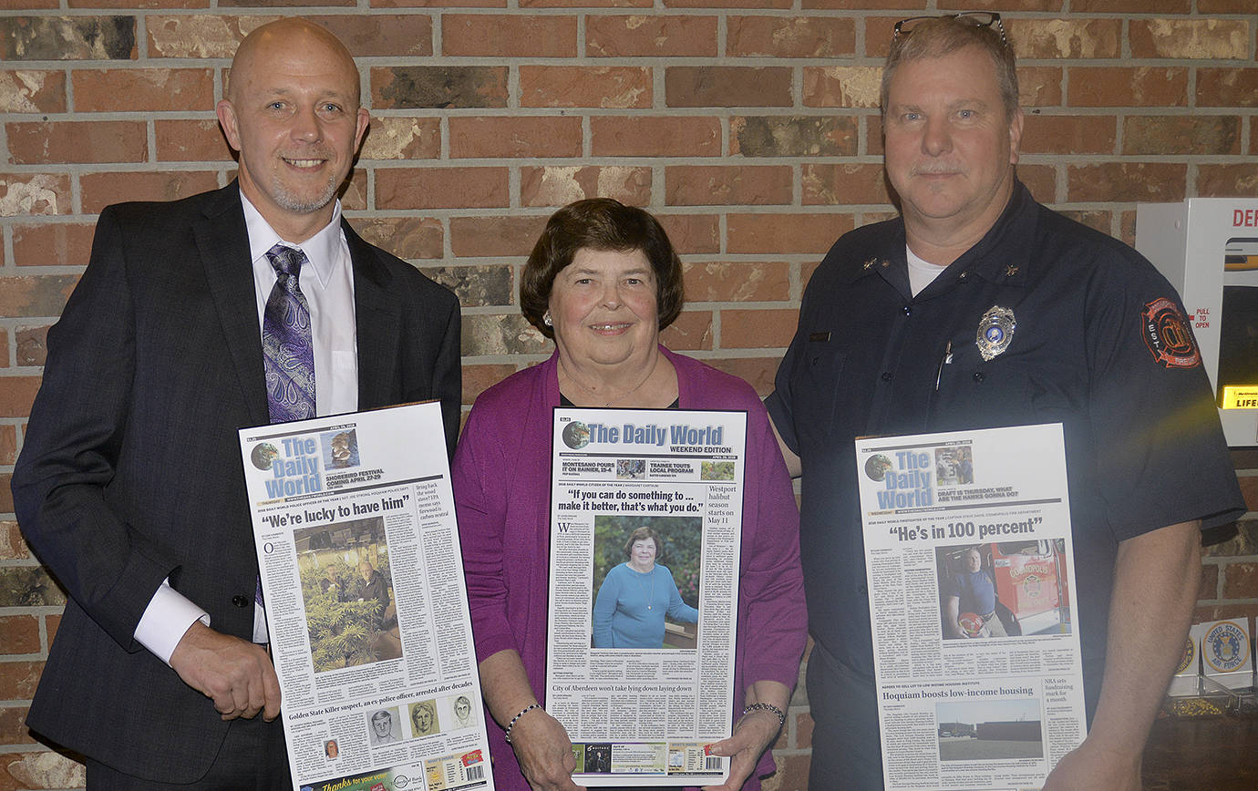 DAN HAMMOCK | THE DAILY WORLD                                From left: The Daily World Police Officer of the Year Joe Strong, from the Hoquiam Police Department and Grays Harbor County Drug Task Force; Citizen of the Year Margaret Carthum, a longtime special educator and current Ocosta principal; and Firefighter of the Year Steve Davis, a longtime volunteer with the Cosmopolis Fire Department.