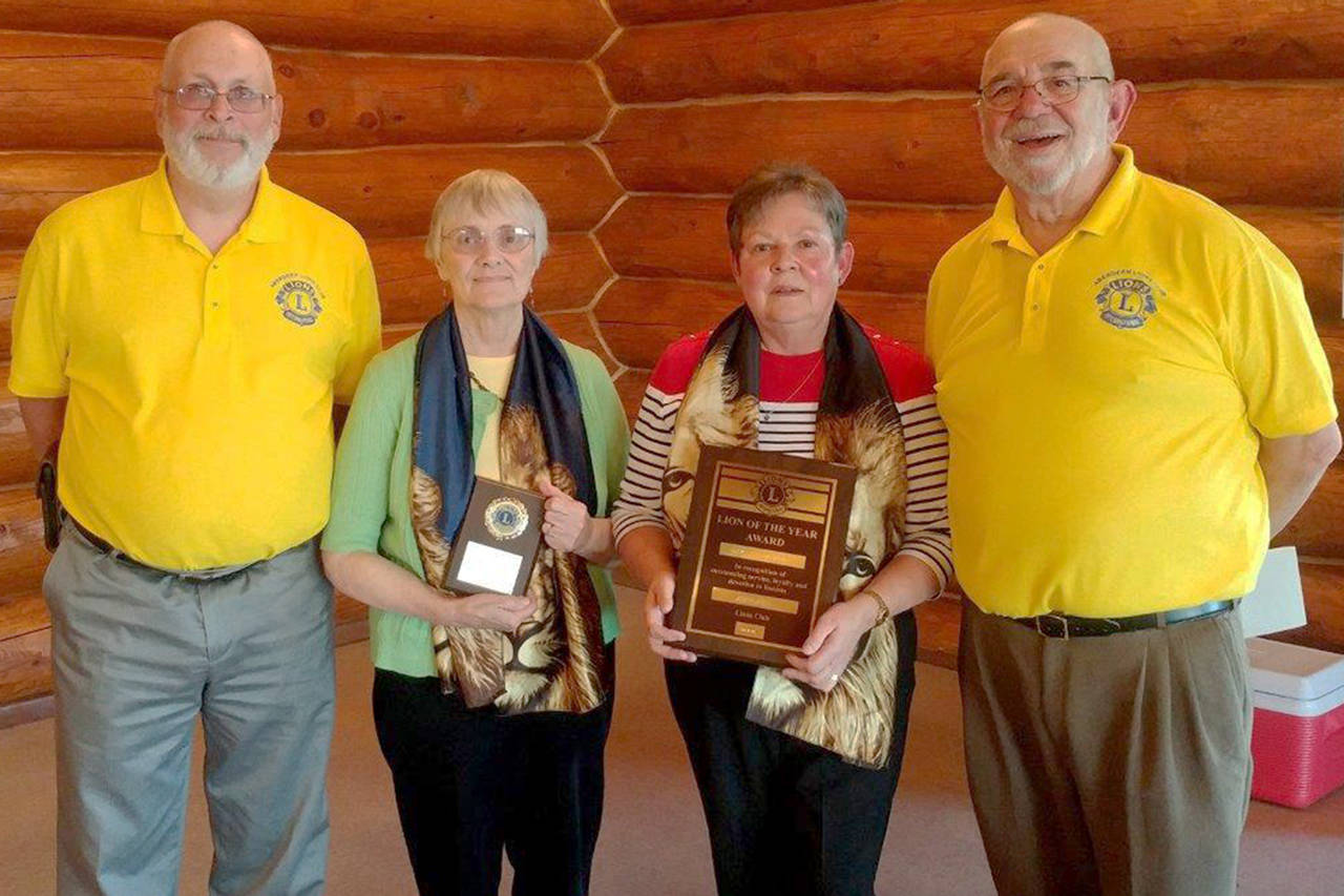 The Aberdeen Lions’ award winners, from left, are Steve Beck, Lion of the Year; Mary Thurman, Rookie of the Year; Phyllis Granahan, Lion of the Year; and Mike Barkstrom, Bull Thrower Award.