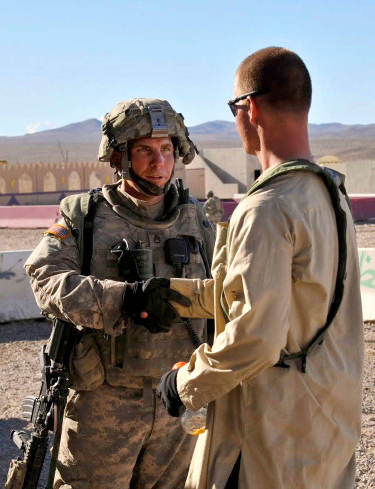 Staff Sgt. Robert Bales, left, is shown during an exercise at the National Training Center in Fort Irwin, California, August 23, 2011. Bales was convicted of shooting, stabbing and burning sleeping villagers in a horrific attack. (U.S. Army Photo via Tacoma News Tribune/MCT)