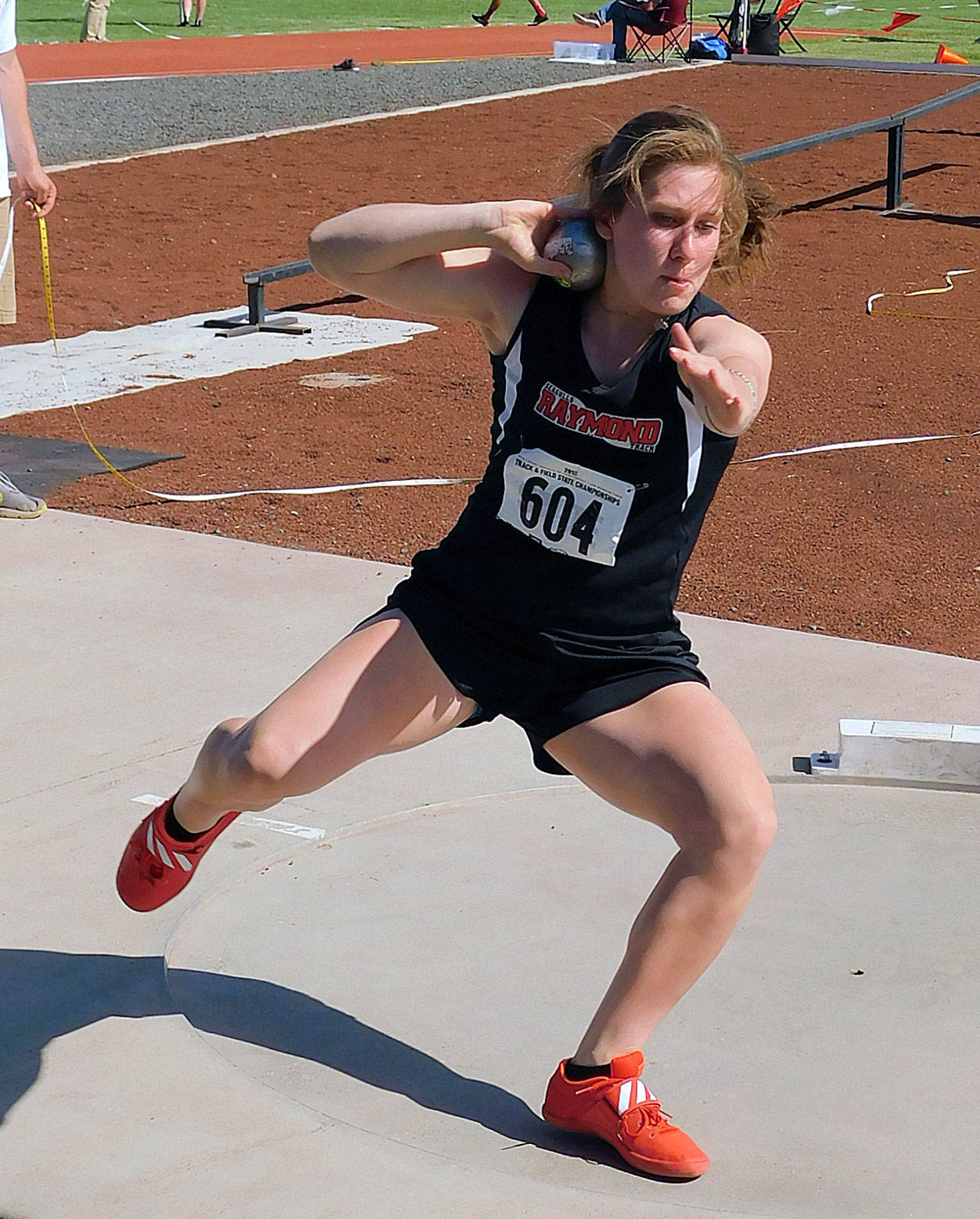 Raymond’s Karlee Freeman, seen here winning the 2B state discus title in May, was named the Gatorade Track & Field Athlete of the Year for the state of Washington on Thursday. (Photo by Shayn Sath)