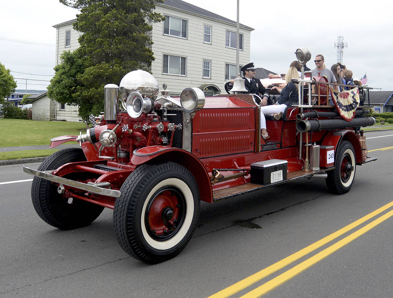 DAN HAMMOCK | THE DAILY WORLD                                Each year, the Aberdeen Fire Department has participated in the Founders Day Parade with this vintage Ahrens Fox fire engine. Although it was damaged in the Aberdeen Museum of History fire June 9, it is drivable and will make an appearance this year.
