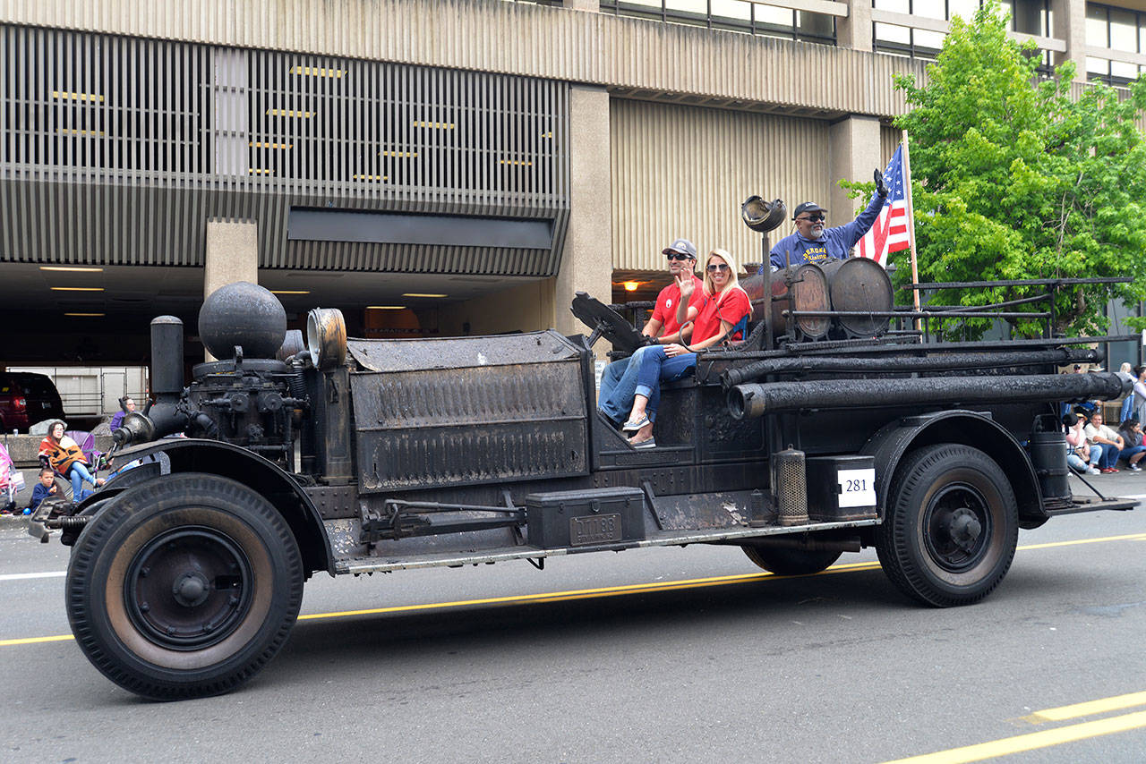 LOUIS KRAUSS | THE DAILY WORLD The scorched firetruck recovered from the Aberdeen Museum of History that burned down recently was driven through the Founders Day Parade on Saturday.