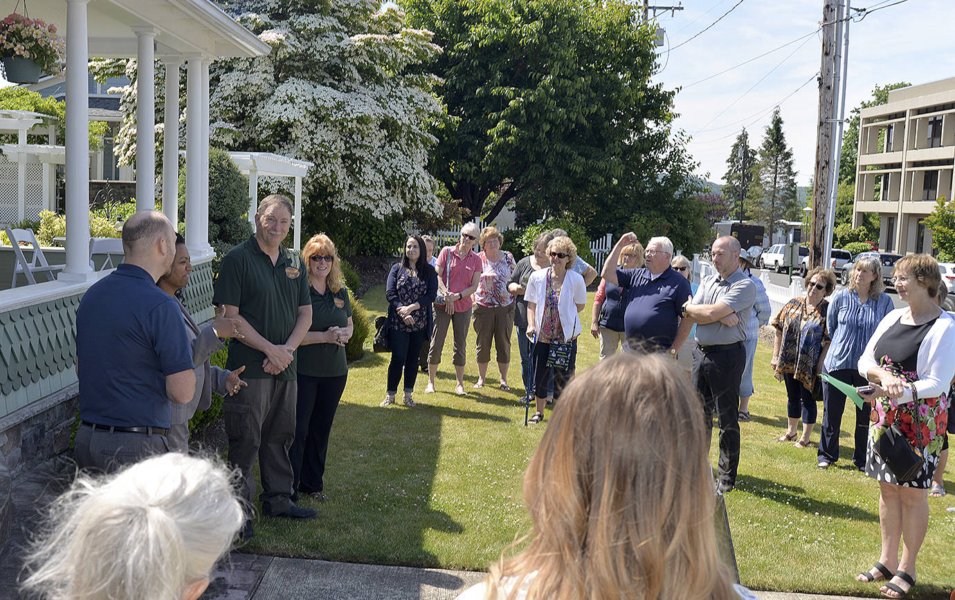 DAN HAMMOCK | TWIN HARBORS NEWSPAPER GROUP                                Dozens of people enjoyed the ribbon cutting and tour of the Montesano Inn bed and breakfast June 20 at the historic Hubble House on the corner of Main and East Spruce.