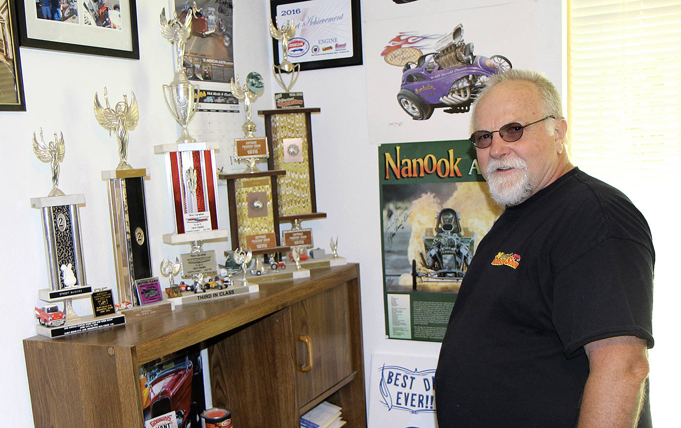 DAN HAMMOCK | THE DAILY WORLD                                Bruce Jones with just some of the trophies he’s earned showing his classic cars for more than 40 years.