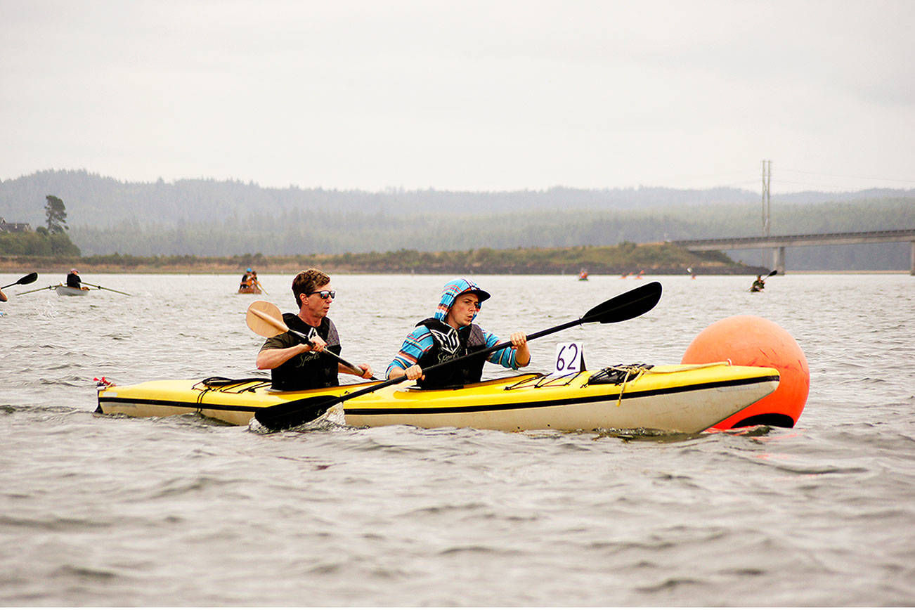 (Courtesy Jon Harwood) Kayakers race in the annual Elk River Challenge near Brady’s Oysters in Westport. Any type of hand or foot-powered boat is allowed to compete.