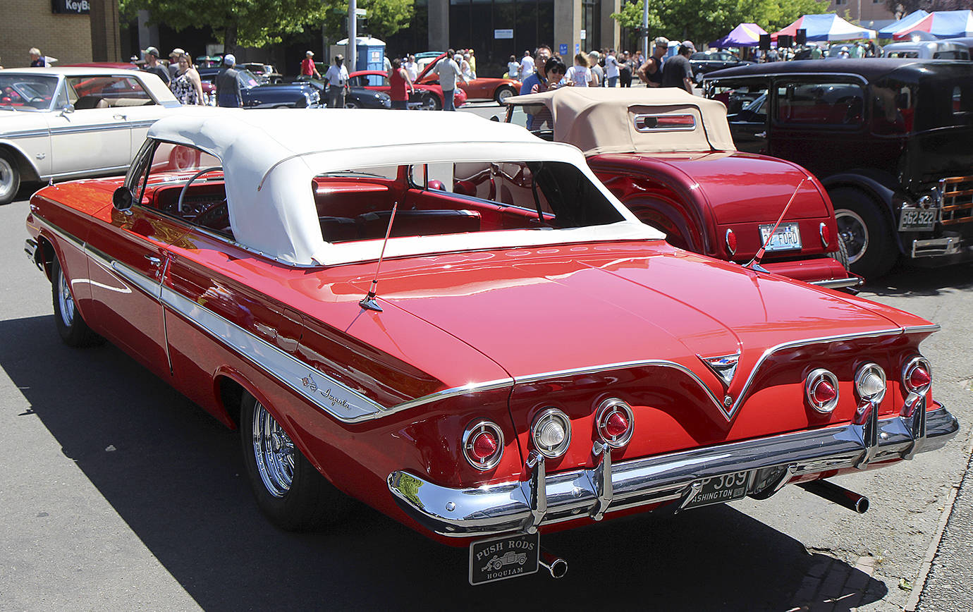 DAN HAMMOCK | THE DAILY WORLD                                Among the cars on display at the Midnight Cruizers car show in Aberdeen Saturday was this bright red late-50s Chevrolet Impala.