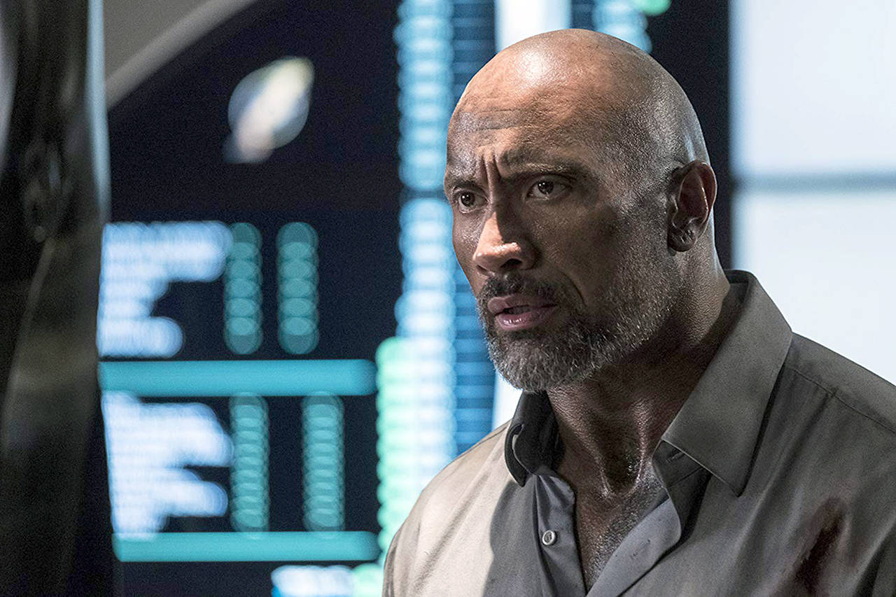 Dwayne Johnson appears in “Skyscraper.” (Kimberly French | Universal Pictures)