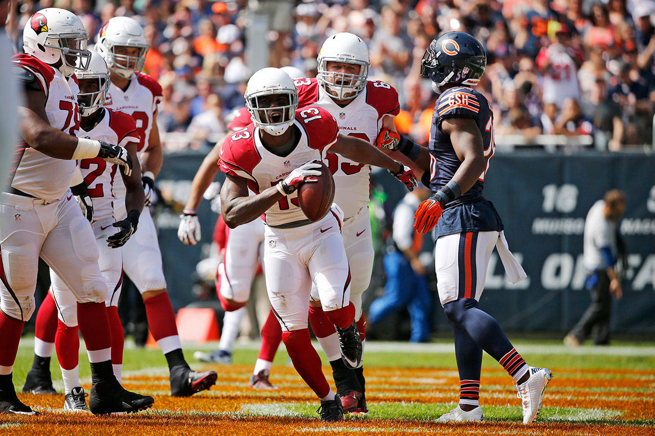 Former Arizona Cardinals wide receiver Jaron Brown (13) celebrates a touchdown run against the Chicago Bears in 2015. Brown signed with Seattle in March. (Jose M. Osorio/Chicago Tribune/TNS)