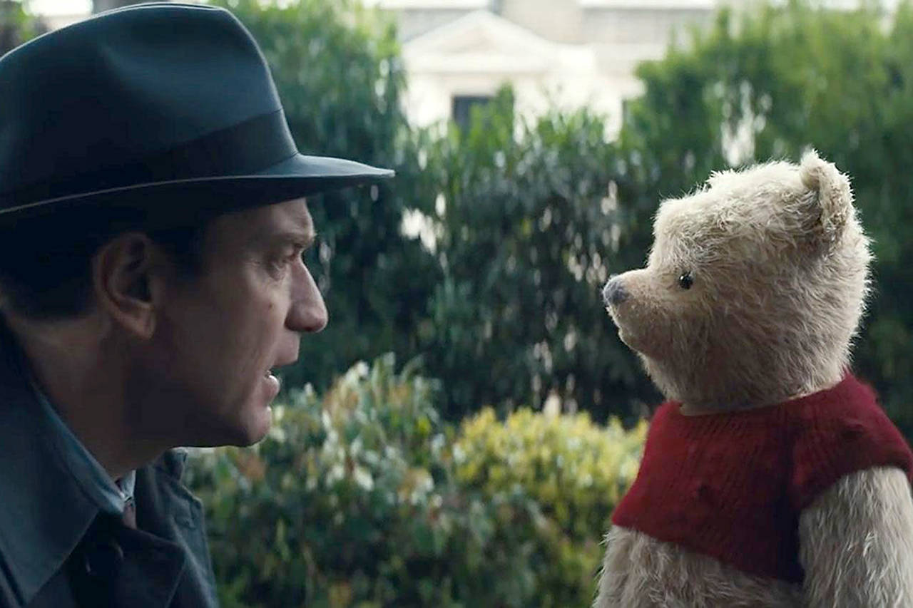 Disney                                 Ewan MacGregor in the title role talks with Winnie-the-Pooh in Disney’s “Christopher Robin.”
