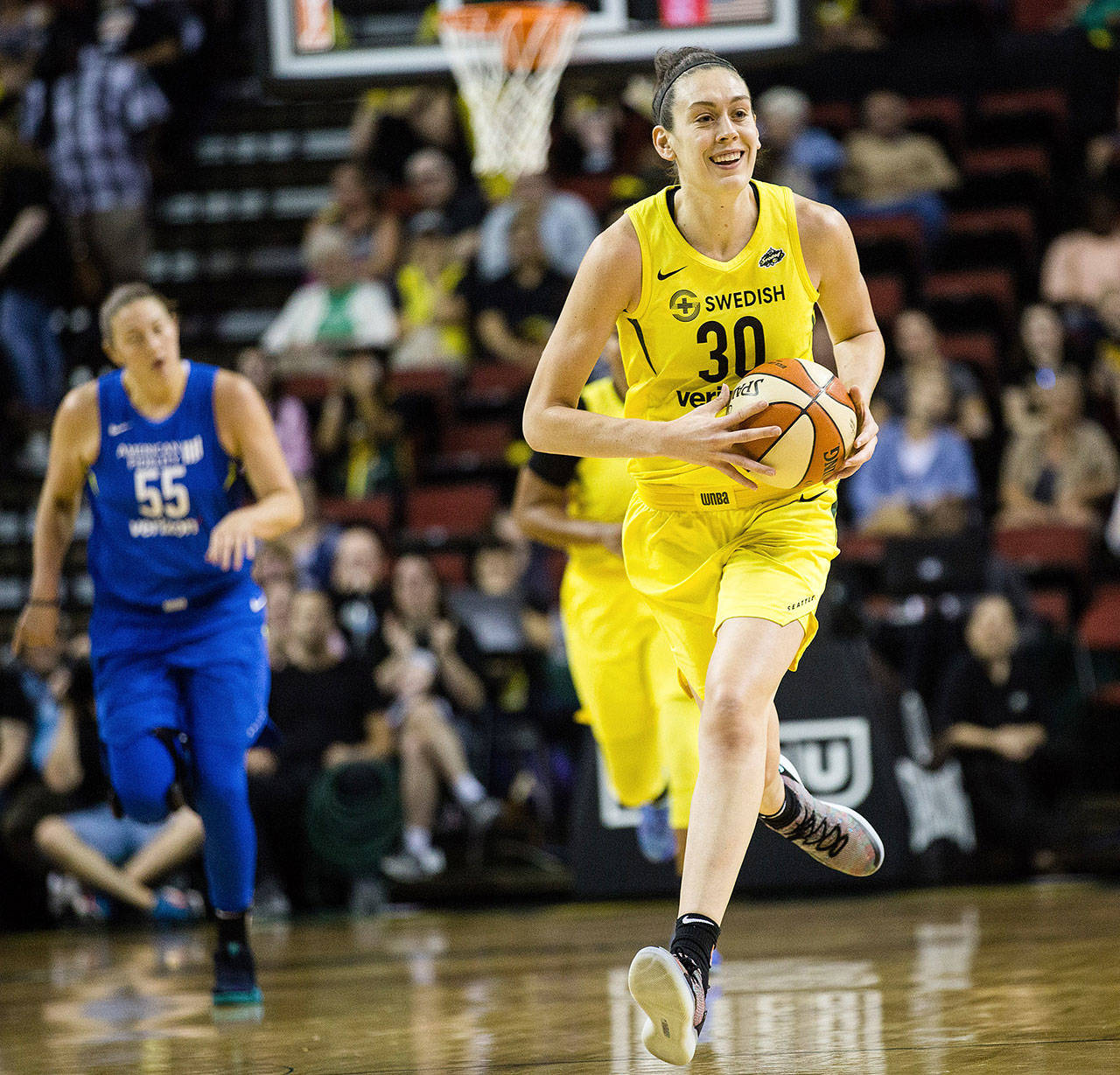 Seattle Storm’s Breanna Stewart smiles as she dribbles down the court after blocking a Dallas Wings shot on Sunday, Aug. 19, 2018 at Key Arena in Seattle, Wash. The Storm beat the Wings 84-68. (Rebekah Welch/Seattle Times/TNS)