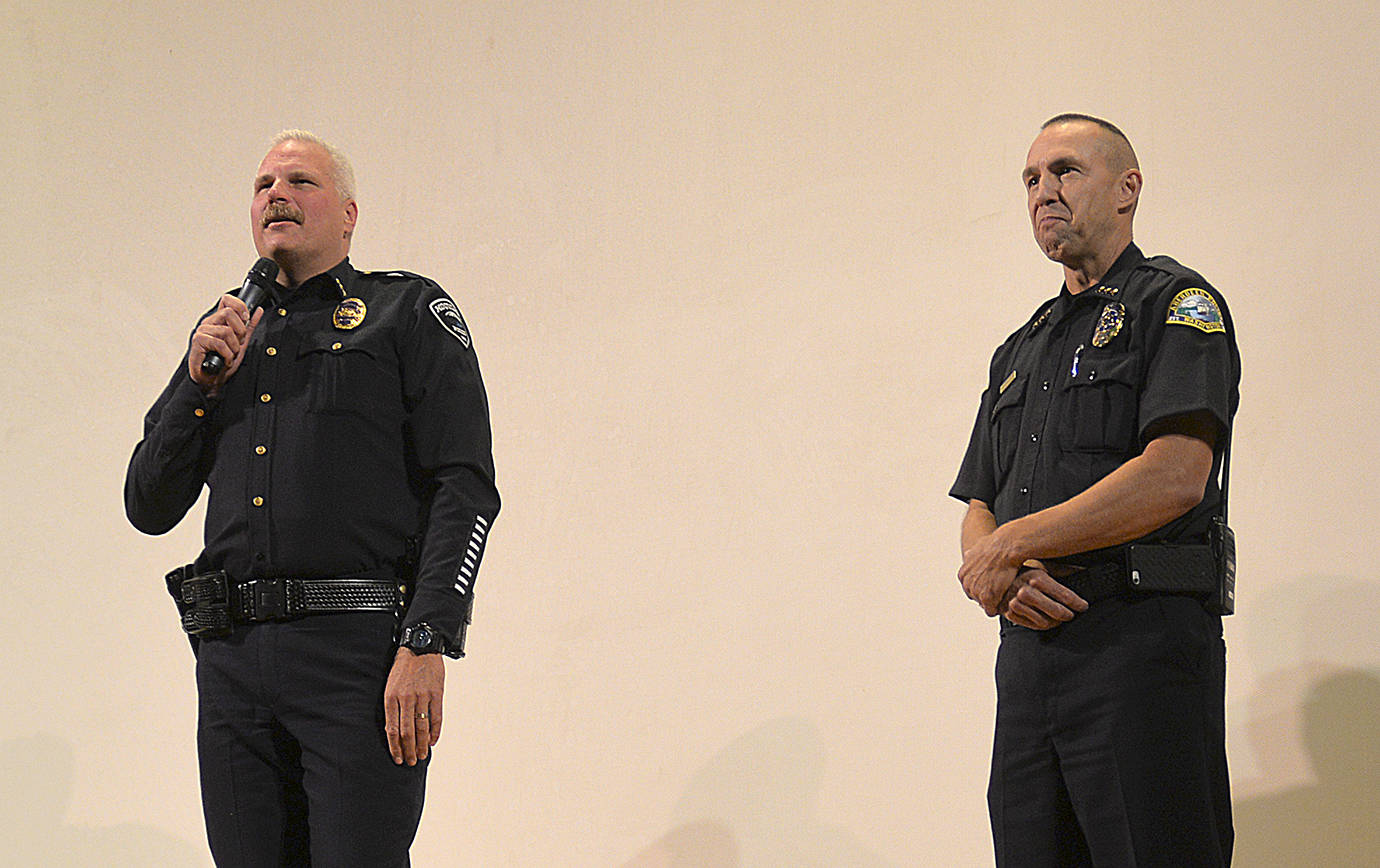 DAN HAMMOCK | THE DAILY WORLD                                Hoquiam Police chief Jeff Myers (left) challenges Aberdeen Police chief Steve Shumate to produce his own lip sync video, specifically to a Nirvana song. The next day, Aberdeen posted on its Facebook page, “Challenge accepted.”