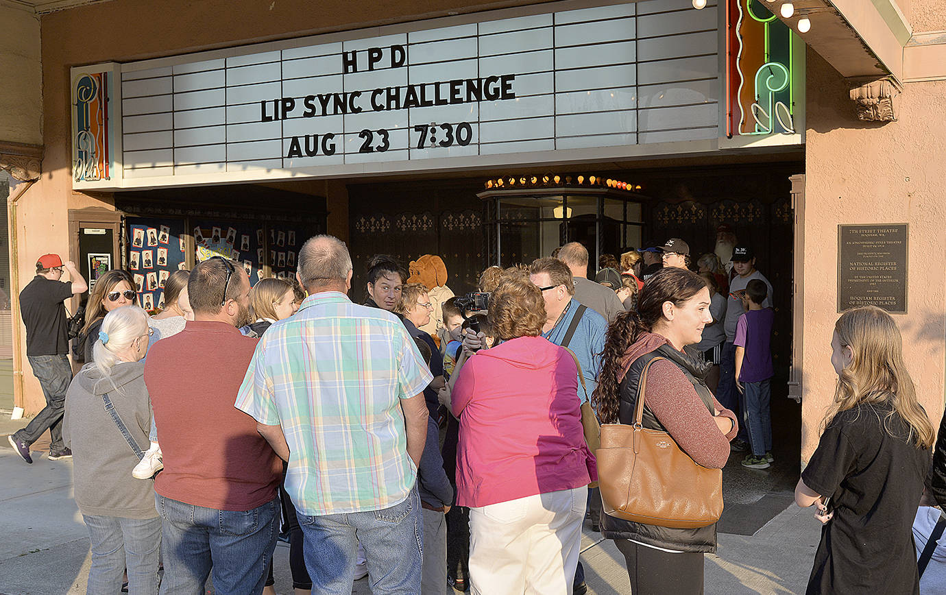 DAN HAMMOCK | THE DAILY WORLD                                People were lined up early for the premier of the Hoquiam Police Department lip sync challenge video at the 7th Street Theatre on Thursday.