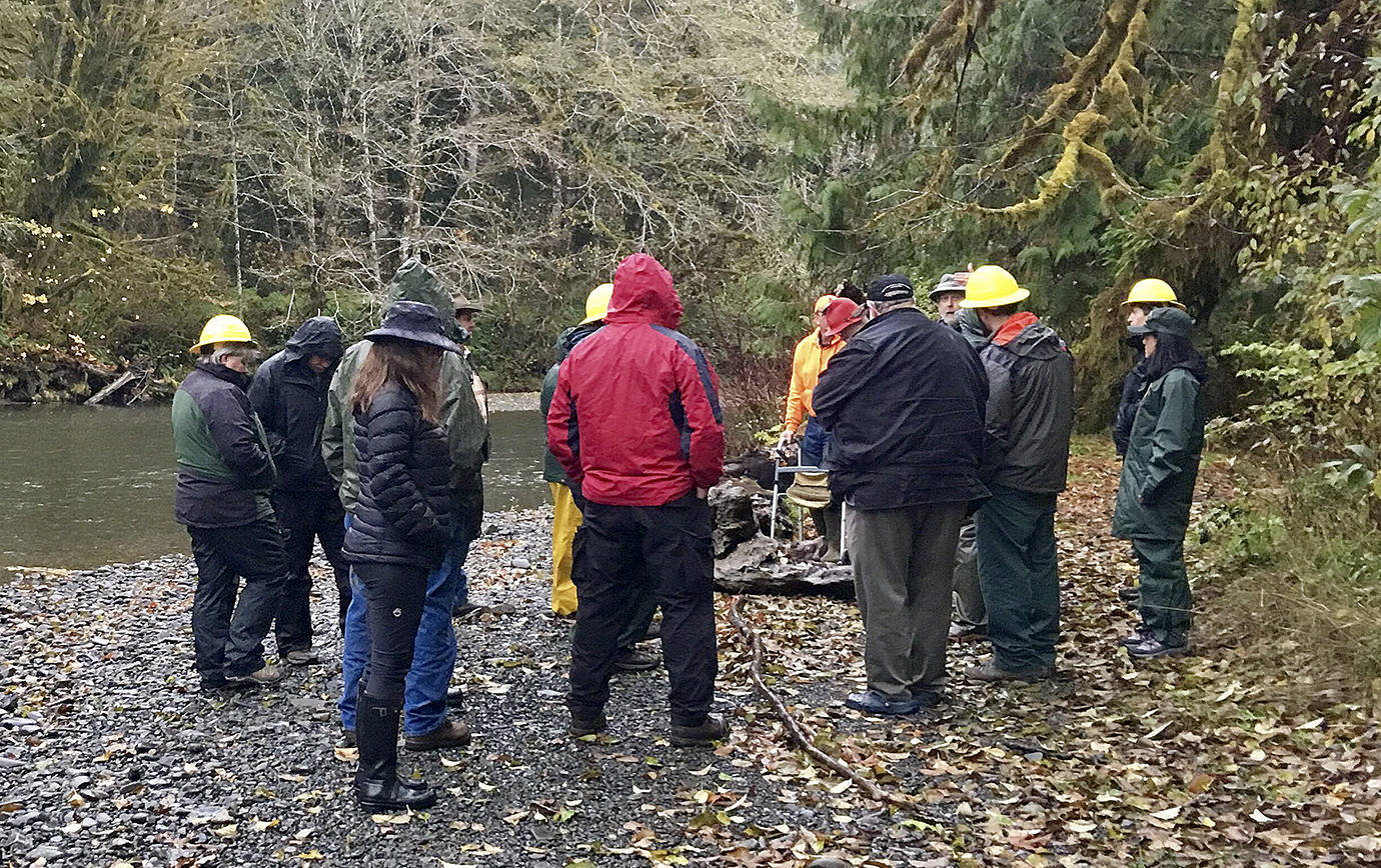 COURTESY PHOTO                                Members of the Olympic Public Access Coalition take a tour of the Rainbow Creek access point on the West Fork of the Humptulip River. Outings like this give coalition members a chance to interact with Forest Service decision makers on issues of access to public lands.
