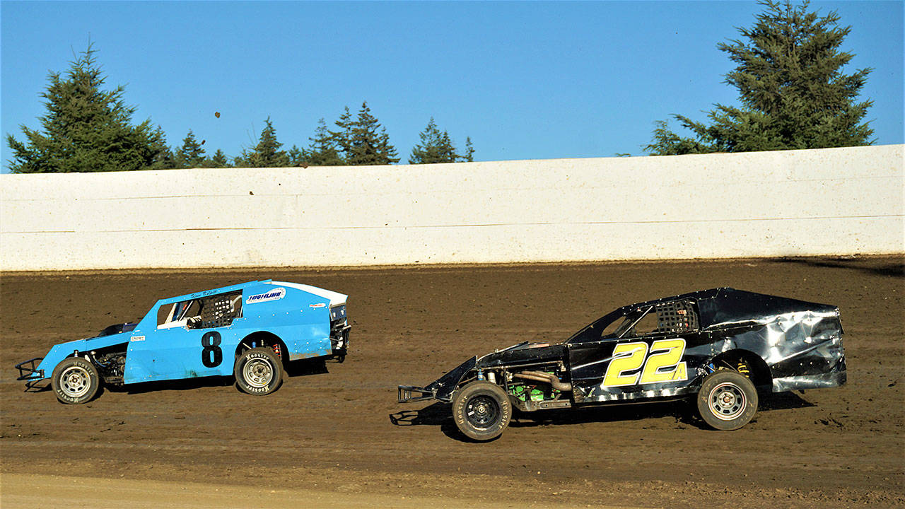 Steve Bulpitt (8) and Justin Austin race for position in the Modifieds class at Grays Harbor Raceway on Sunday. (Photo by AR Racing Videos)