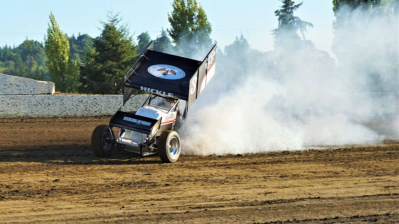 The No. 3 car of JJ Hickle starts smoking during hot laps at Grays Harbor Raceway in Elma on Sunday. (Photo by AR Racing Videos)