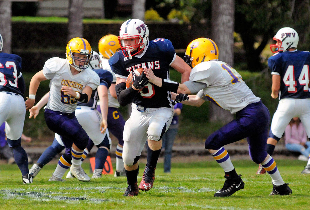 PWV running back Peter Hamilton runs for a first down against the Concrete Lions on Saturday at Willapa Valley High School. PWV won the game 42-0. (Ryan Sparks | The Daily World)