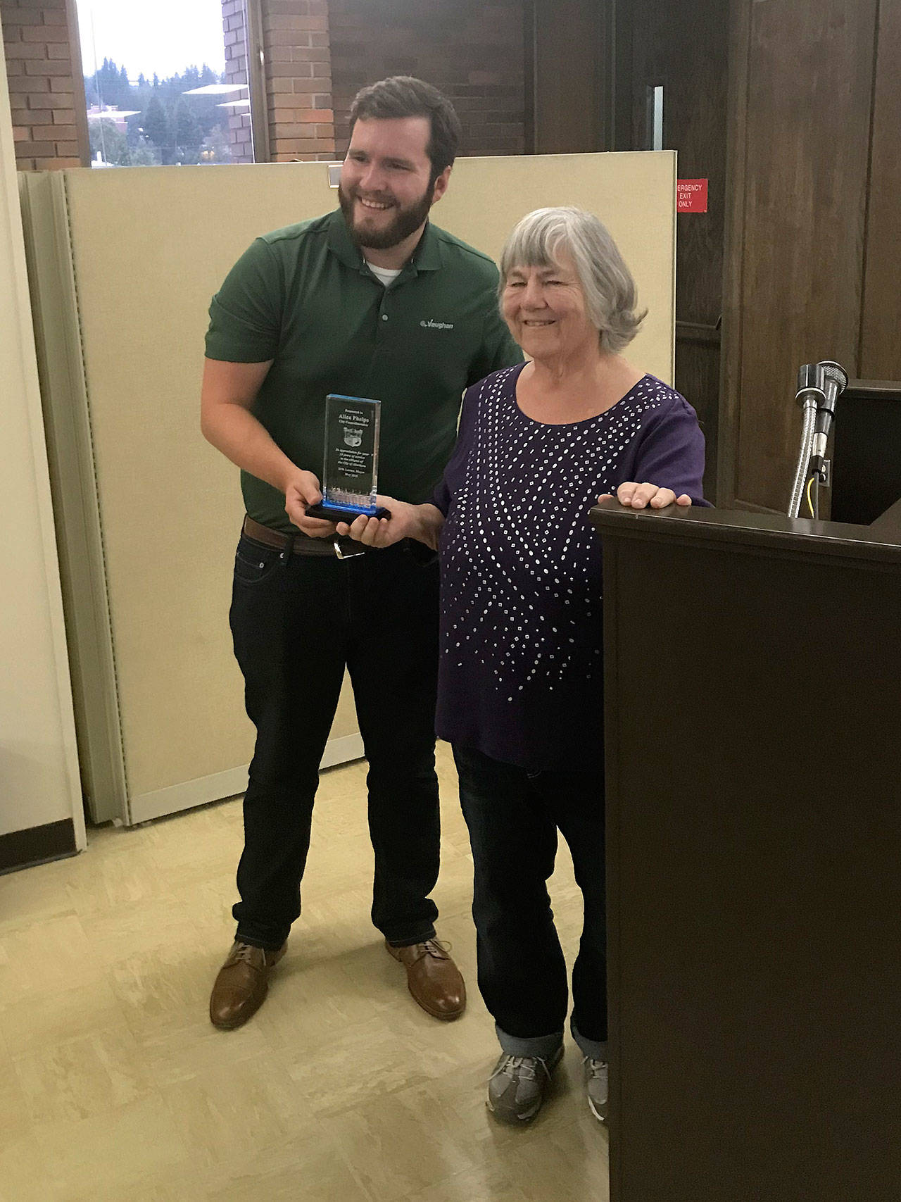 Louis Krauss | The Daily World                                Aberdeen Mayor Erik Larson presents an award to Alice Phelps as appreciation for her more than 19 years of service as a council member for the city.