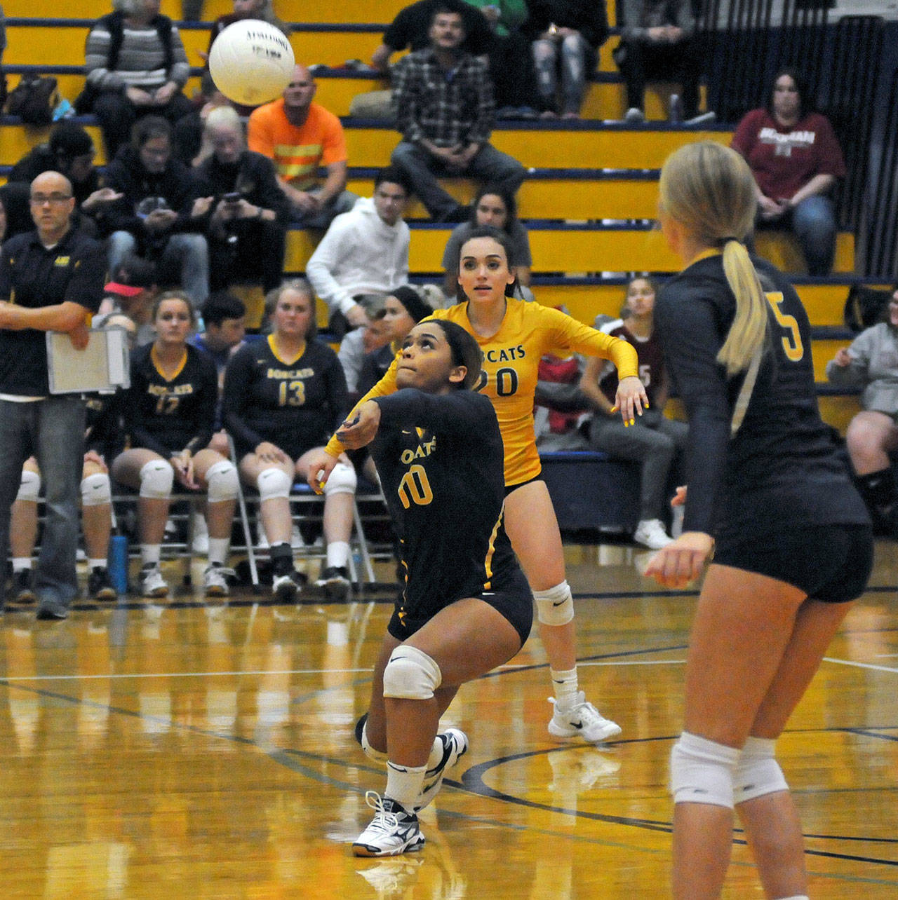 Aberdeen’s Malynda Winston receives a serve during the Bobcats’ 3-1 win over Hoquiam on Tuesday. (Ryan Sparks | The Daily World)