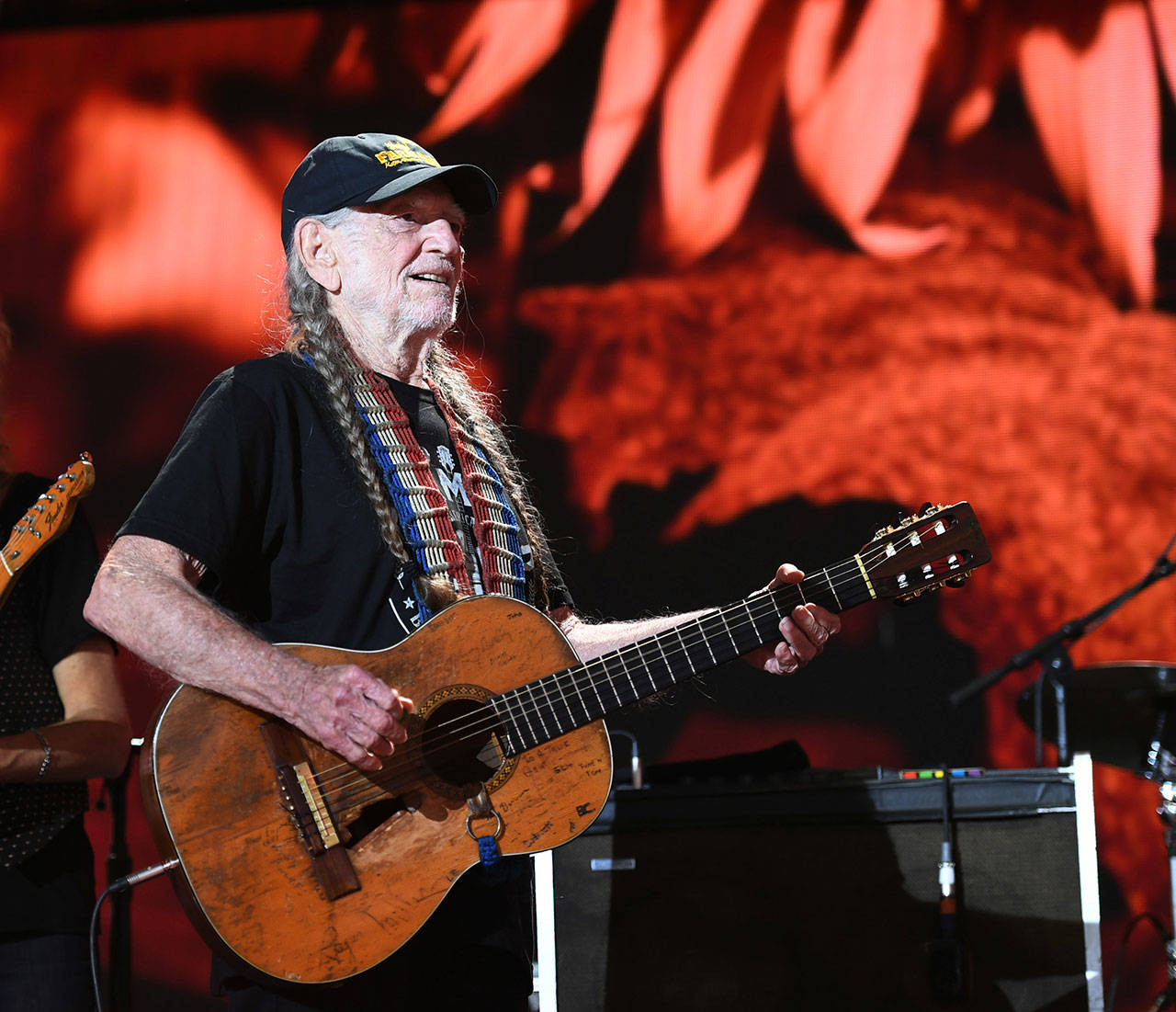 Willie Nelson entertains the crowd at Farm Aid 2017 In Burgettstoen, Pa.. Nelson will play at a rally for Texas senatorial candidate Beto O’Rourke on Sept. 29. (Jeff Moore/Zuma Press/TNS)