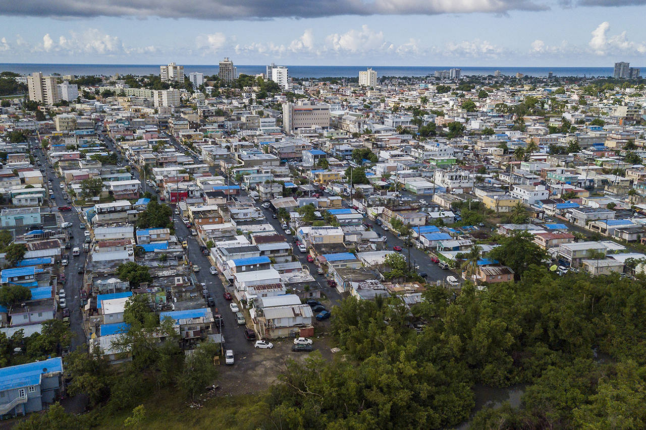 Many homes in the Cano Martin Pena communities in San Juan, Puerto Rico, still lack permanent roofs a year after Hurricane Maria. (Matias J. Ocner | Miami Herald)