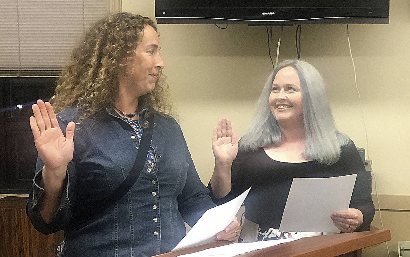 DAN HAMMOCK | THE DAILY WORLD                                Shannon Patterson (left) is sworn in to the Ward 3 Hoquiam City Council position by Mayor Jasmine Dickhoff Monday. She takes over the position from Kevin Swope, who recently resigned to take a position with the Hoquiam City Jail.