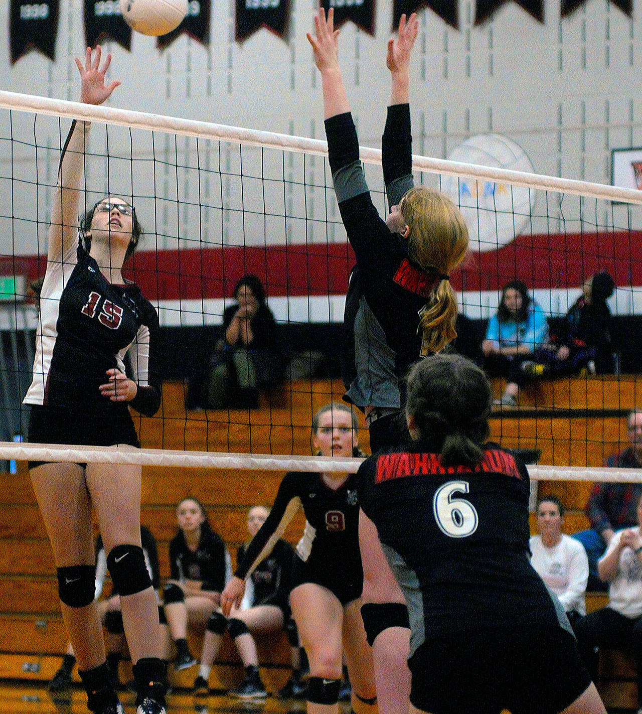 Ocosta’s Kylee Poirier gets a shot over the net in the fourth set against Wahkiakum. (Hasani Grayson | Grays Harbor News Group)
