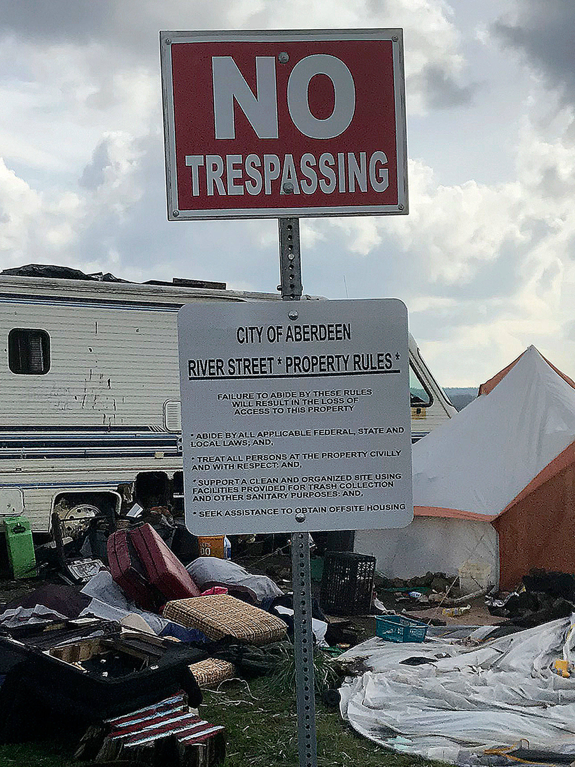 Louis Krauss | Grays Harbor News Group                                One of the signs posted at the homeless camps along the Chehalis Riverfront property.