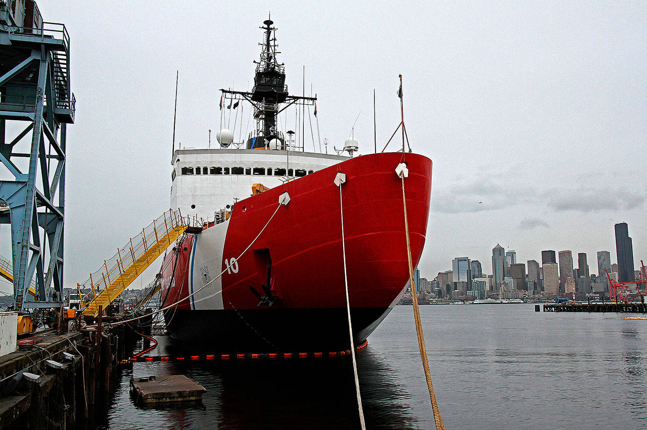 The Polar Star, a 1970s-era Coast Guard icebreaker, is undergoing a four-year, $57 million overhaul at Vigor Industrial on Harbor Island in Seattle. Its twin, the Polar Sea, is idled nearby; that ship’s engines failed last year and its future is in doubt. (Mark Harrison/Seattle Times).