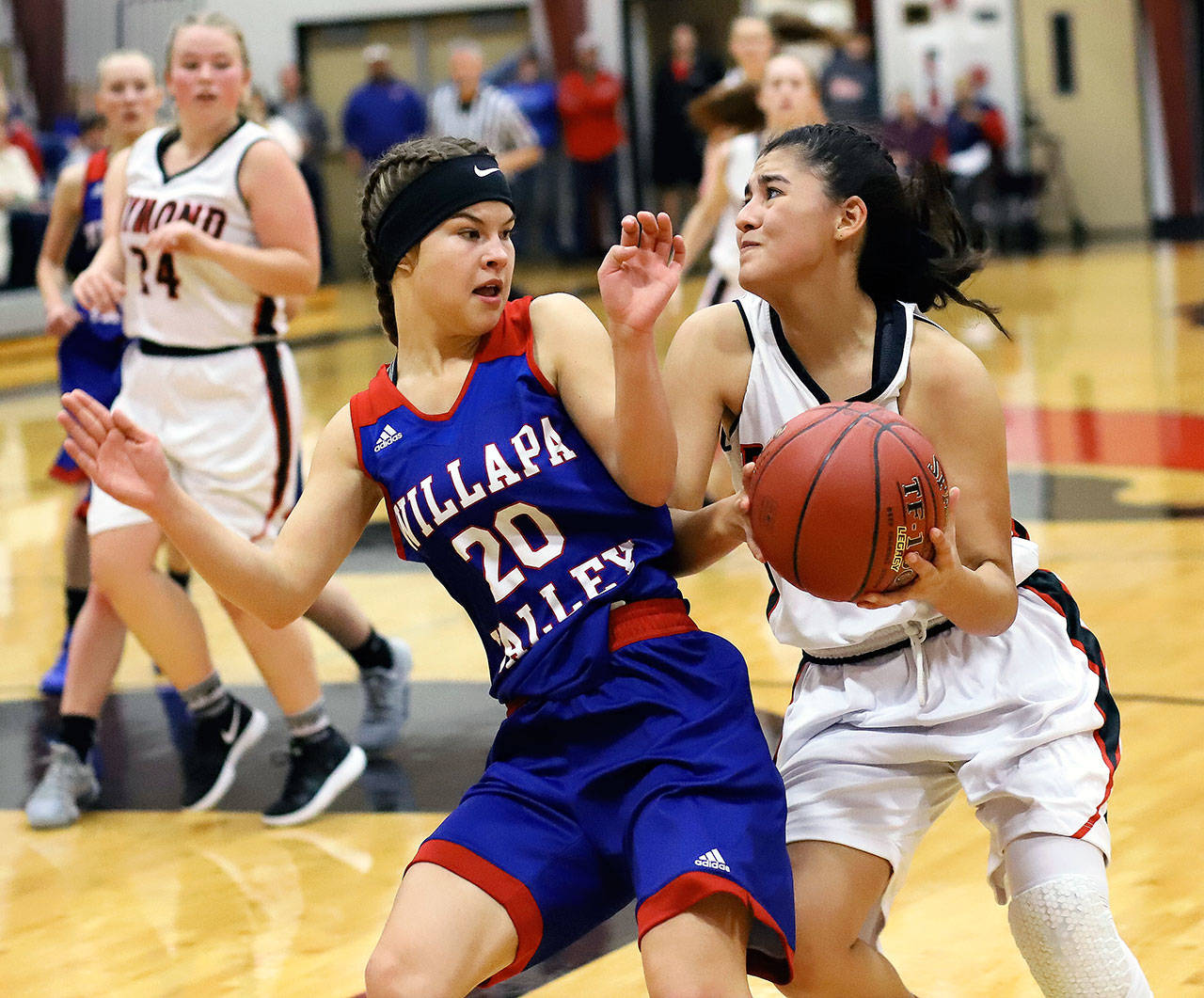 Willapa Valley’s Brooke Friese, left, pressures Raymond’s Ana Silva during a game on Thursday at Raymond High School. (Photo by Larry Bale)