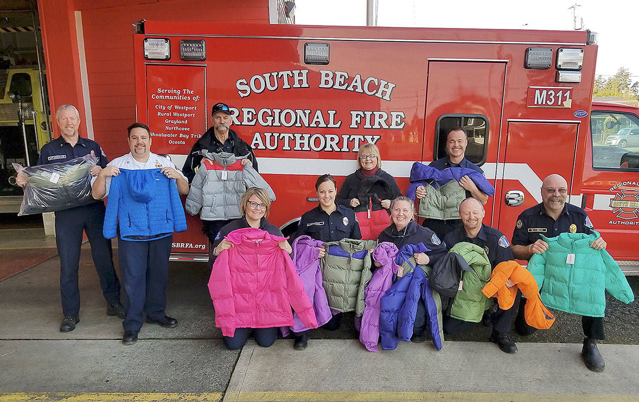 COURTESY PHOTO                                South Beach firefighters were able to purchase more than 100 winter coats by participating in Operation Warm, a program where participants get deep discounts to donate coats to children within the community.