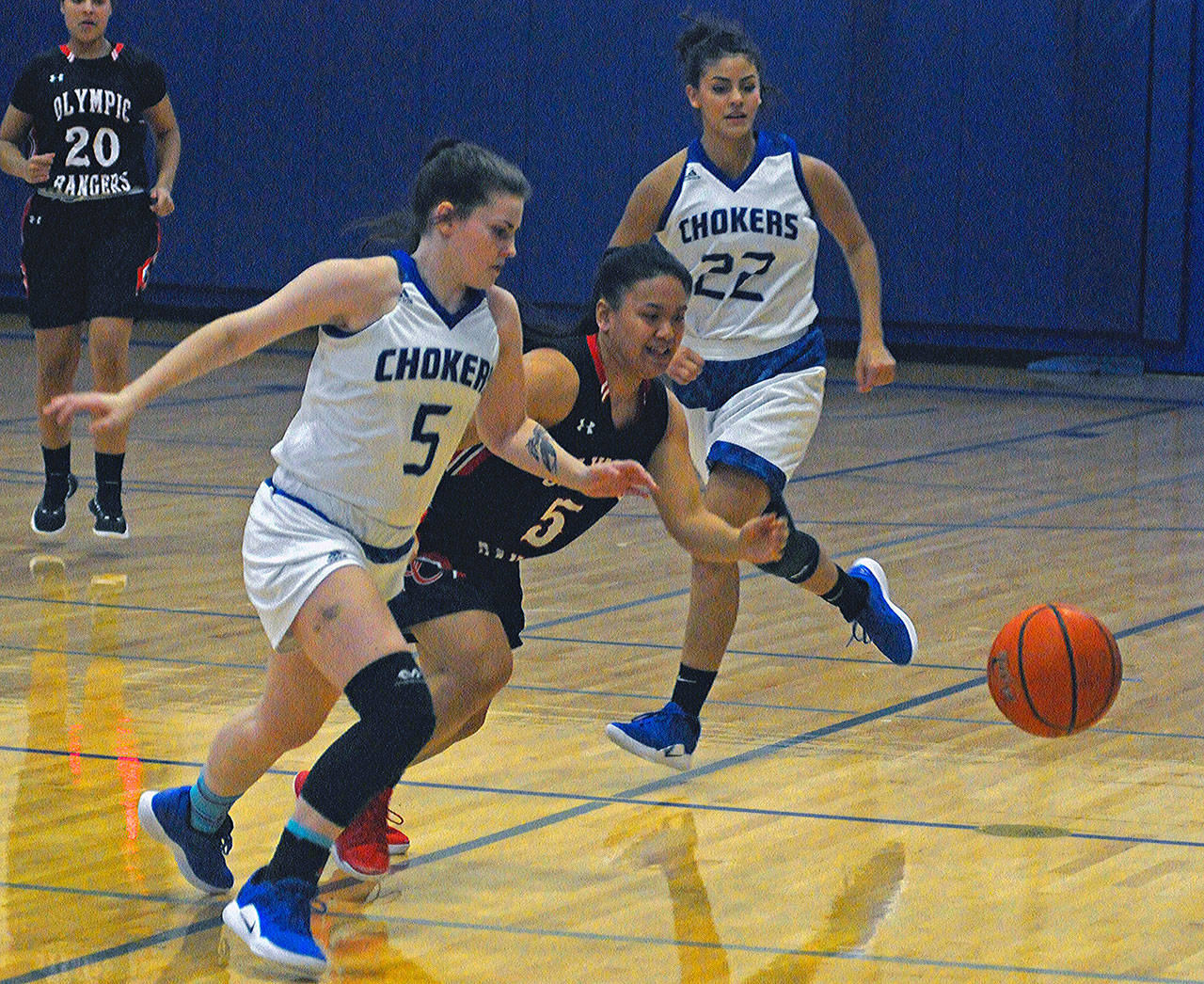 Grays Harbor’s Keeley Teel chases down a loose ball in a game against Olympic on Satuday. Teel led the team with five steals. (Hasani Grayson | Grays Harbor News Group)