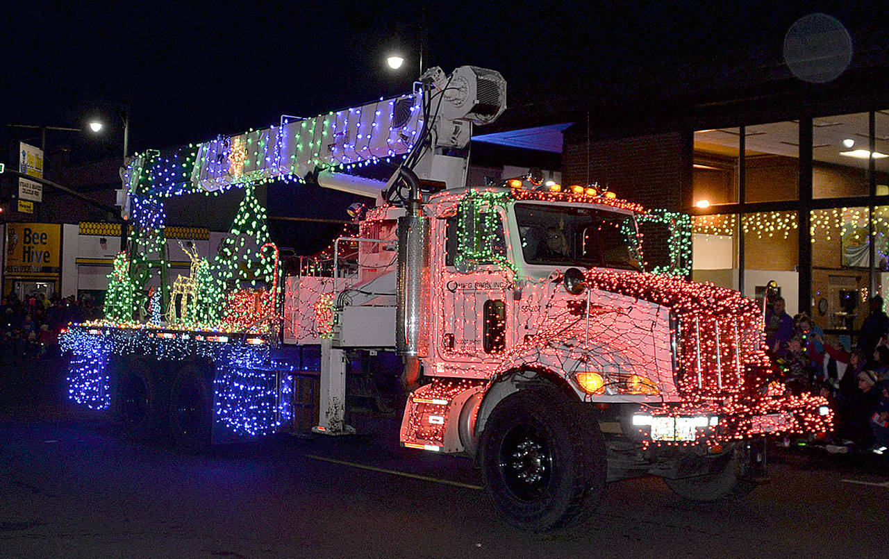 DAN HAMMOCK | GRAYS HARBOR NEWS GROUP                                The Quigg Bros. entry in the Montesano Festival of Lights parade took the sweepstakes award Saturday evening.