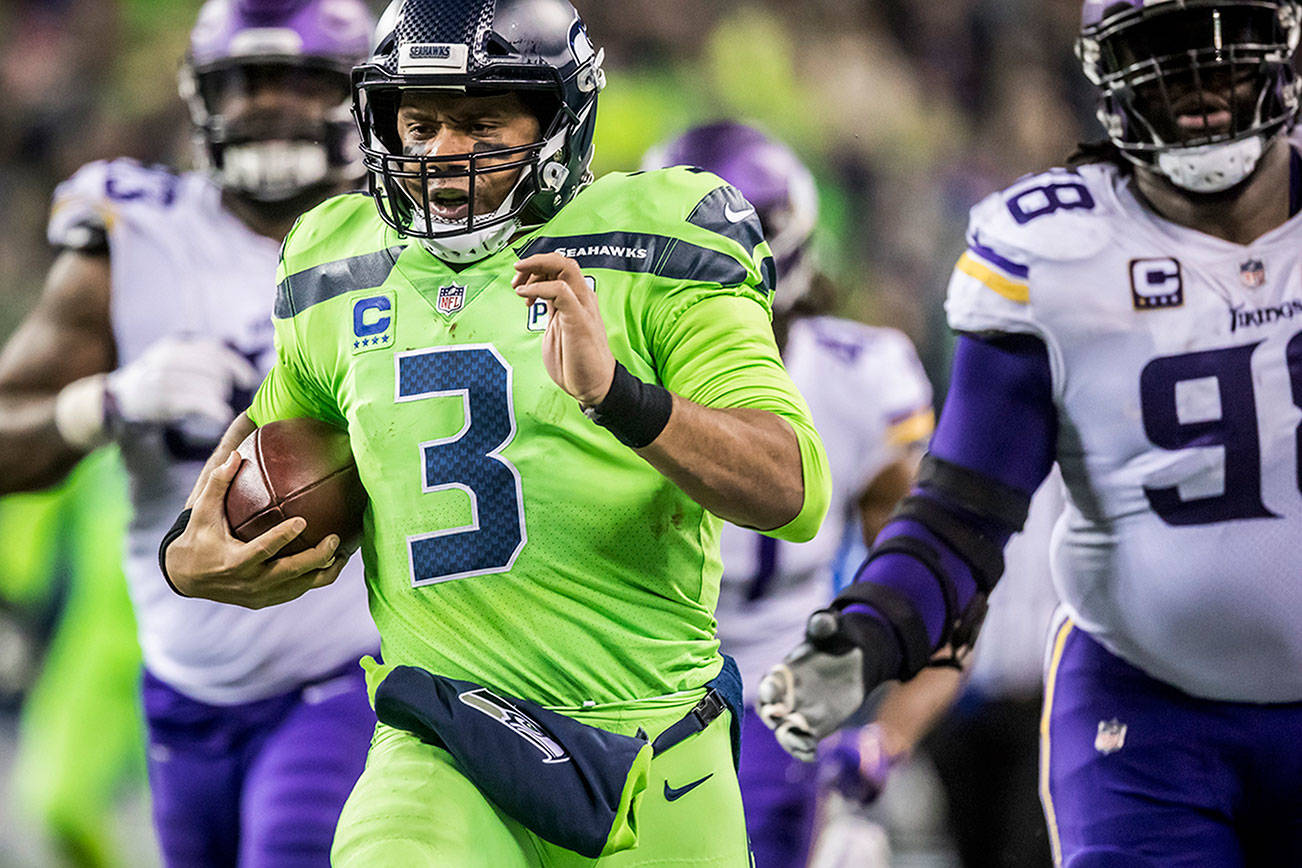 ‘We found a way.’ Wilson turned in career passing lows, but Seahawks mustered enough offense for a win