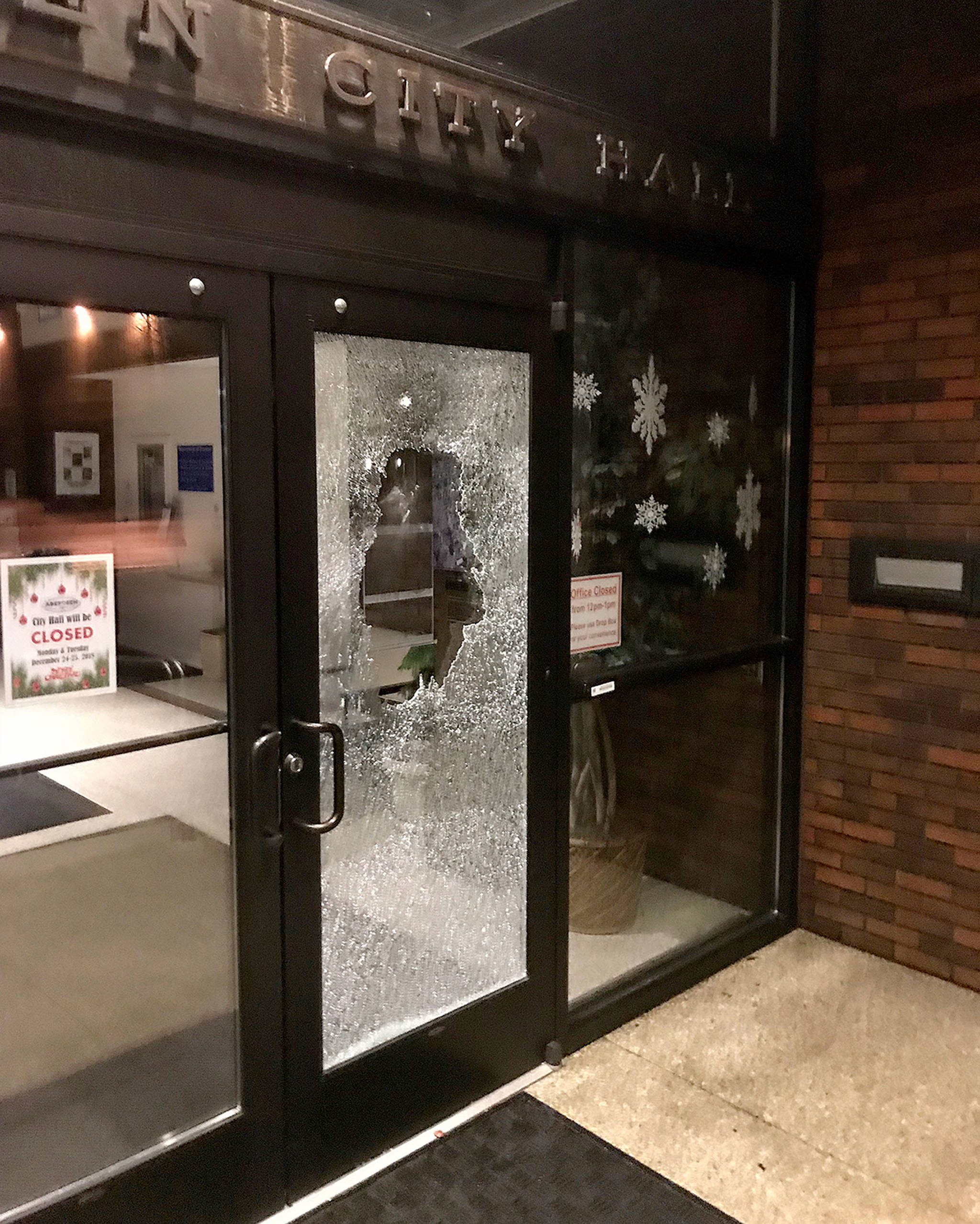 (Louis Krauss | Grays Harbor News Group) A man broke the glass door on the Market Street entrance to Aberdeen City hall around 10:30 p.m. Saturday.