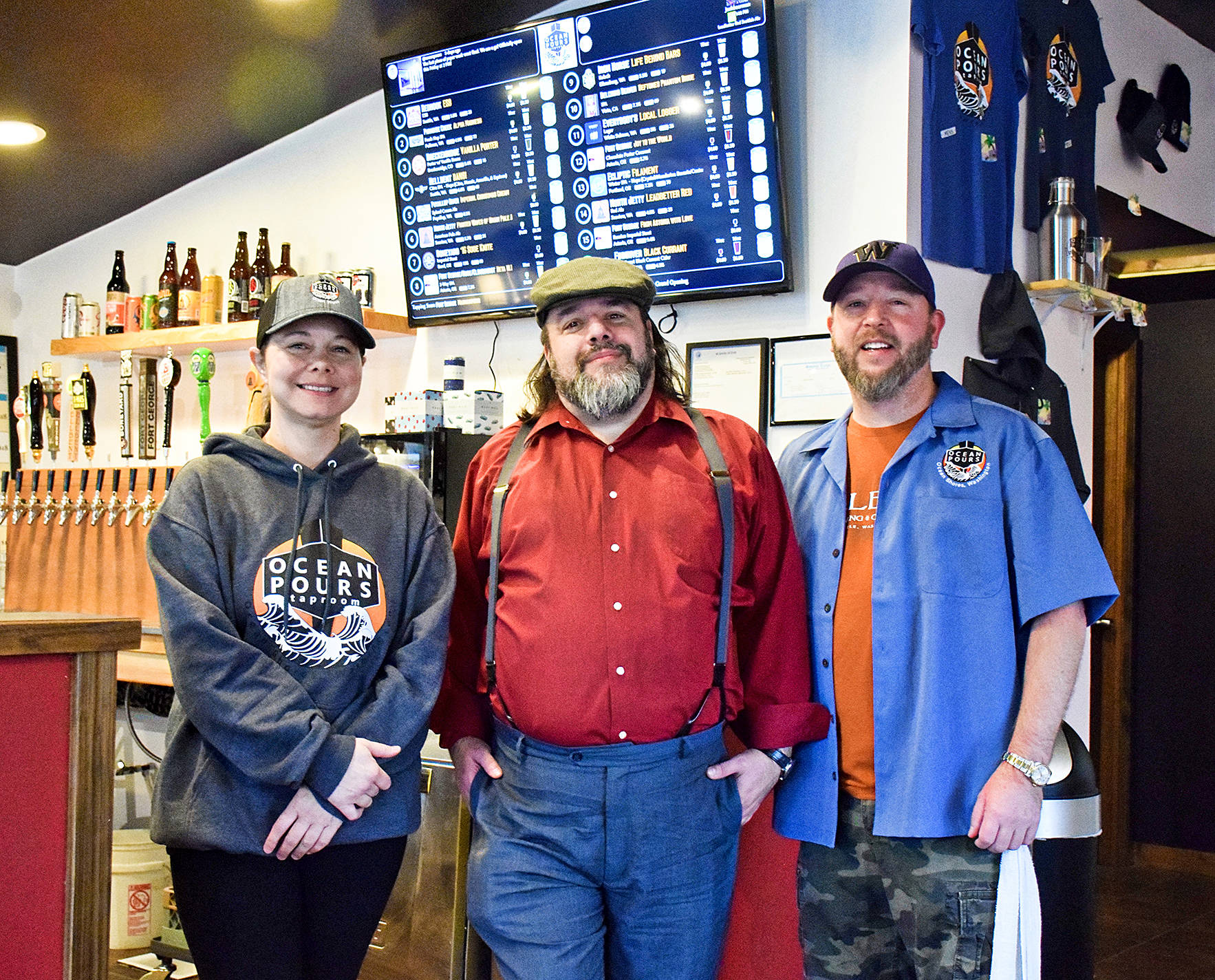 From left, bartender Beth Douglas, general manager Chris Shifman and co-owner Randy Gardner of the newly opened Ocean Pours Taproom.