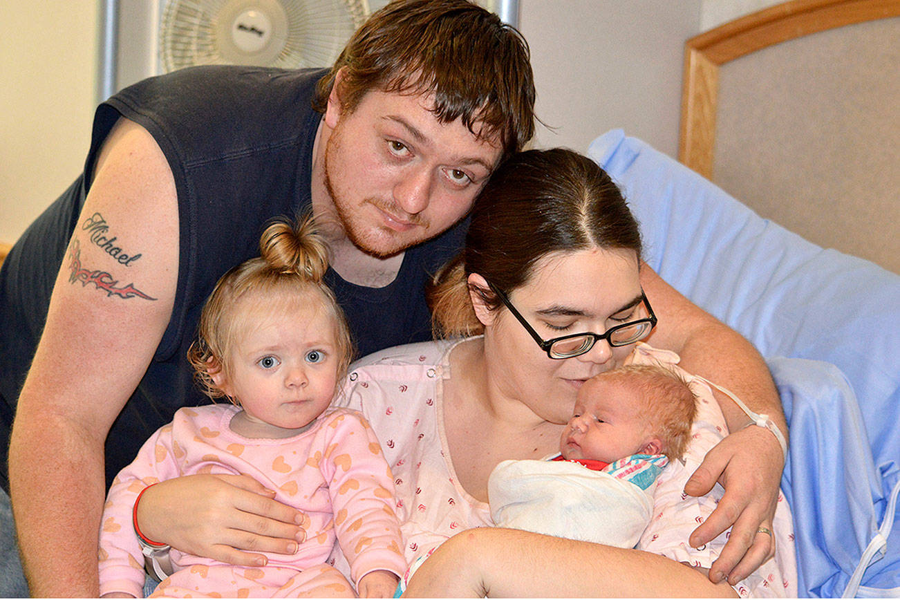 Courtesy Grays Harbor Community Hospital                                Mathanual Anthony Joseph Fruchella, bottom right, was the first baby of 2019 delivered at Grays Harbor Community Hospital. He’s pictured here with his parents and sister.