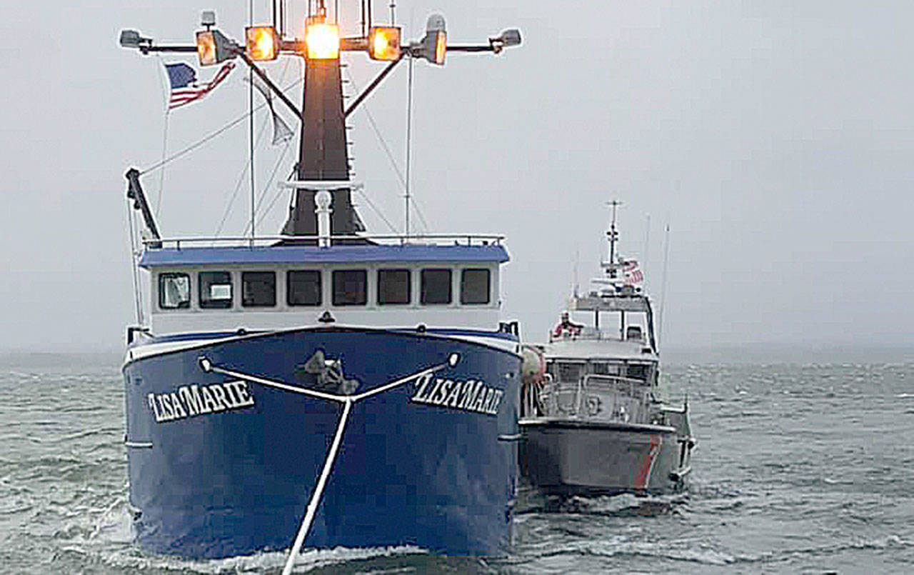COURTESY COAST GUARD STATION CAPE DISAPPOINTMENT Several crews from the US Coast Guard teamed to tow a fishing vessel through high winds and rough seas after it went adrift Thursday evening.