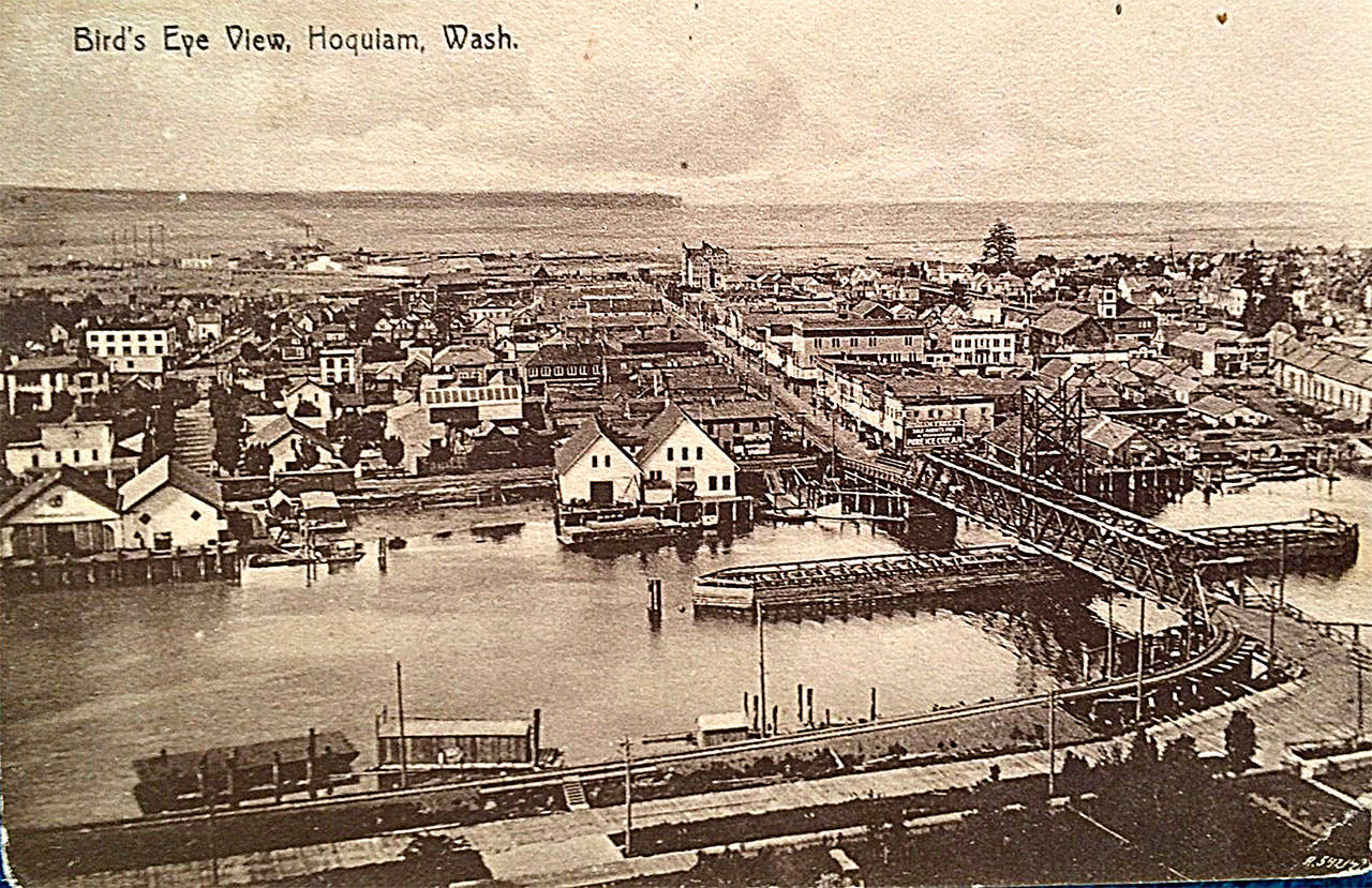 A postcard photo of Hoquiam as it appeared around 1909 taken from across the Hoquiam River. On the left is the Northwestern Lumber Company’s Commercial Dock at the foot of 9th Street. In the center is the Polson Co. dock next to the then-new Eighth Street Bridge. The massive Hoquiam Hotel is visible in the distance. (Roy Vataja Collection)