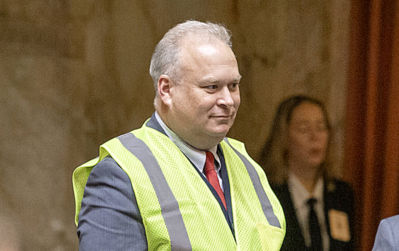 COURTESY LEGISLATIVE PHOTOGRAPHY                                Rep. Jim Walsh, R-Aberdeen, donned a yellow safety vest ahead of Gov. Jay Inslee’s State of the State Address Tuesday to protest the Governor’s proposed carbon tax.