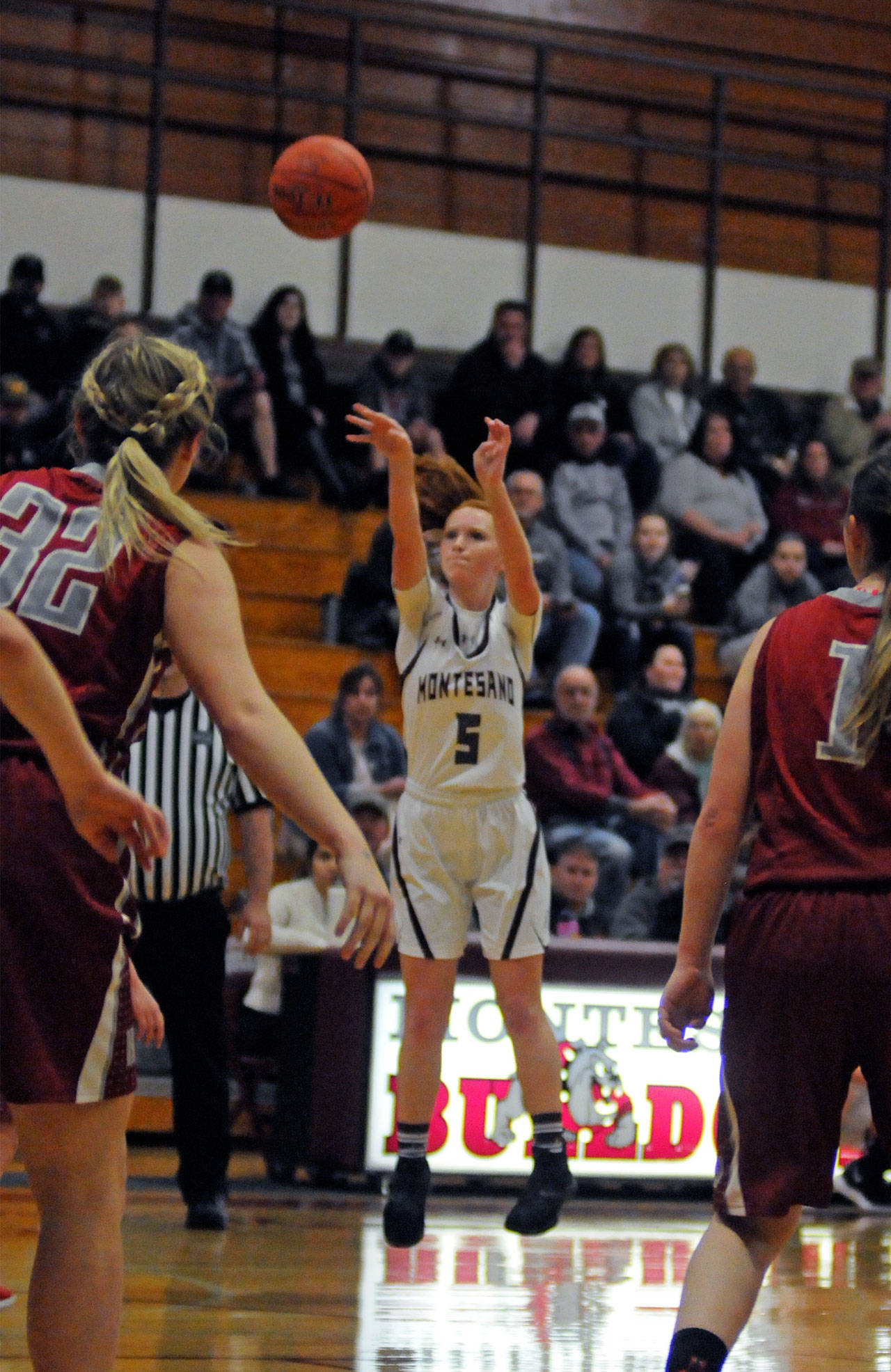 Montesano guard Glory Grubb puts up a shot during Thursday’s game against Hoquiam. Grubb scored eight points, six of those coming off two 3-pointers in the fourth quarter to help the Bulldogs pull away. (Ryan Sparks | Grays Harbor News Group)