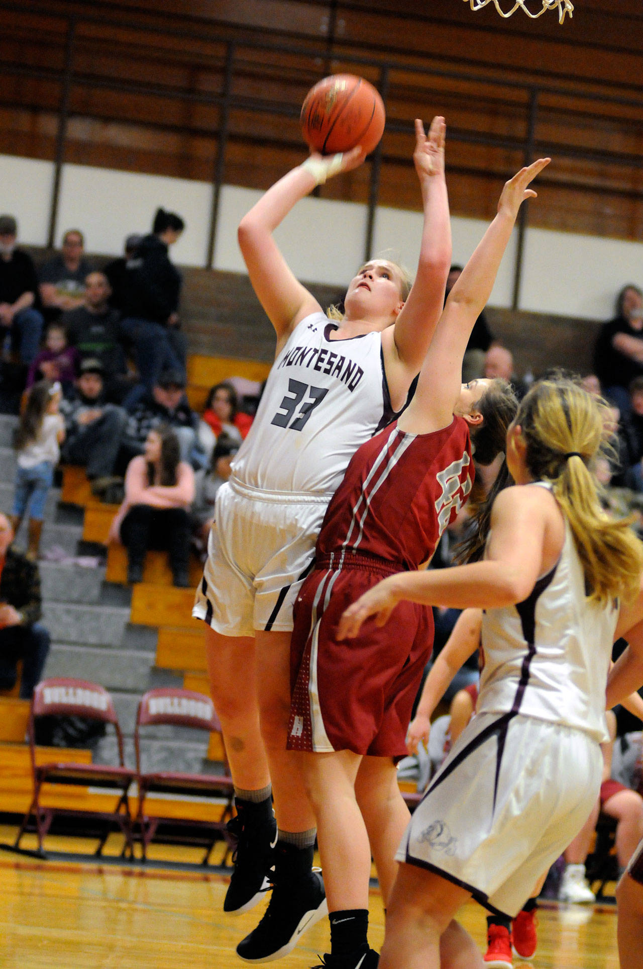 Montesano center Zoe Hutchings scores two of her team-high 21 points in a 74-51 win over Hoquiam on Thursday. (Ryan Sparks | Grays Harbor News Group)