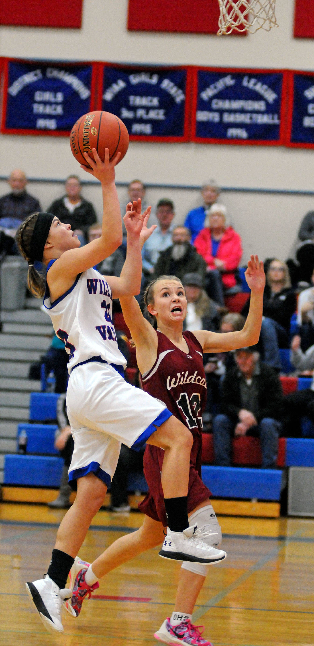 Willapa Valley’s Brooke Friese rises for a shot against Ocosta’s Kjristin Hopfer during the Wildcats’ 43-40 win on Tuesday. (Ryan Sparks | Grays Harbor News Group)