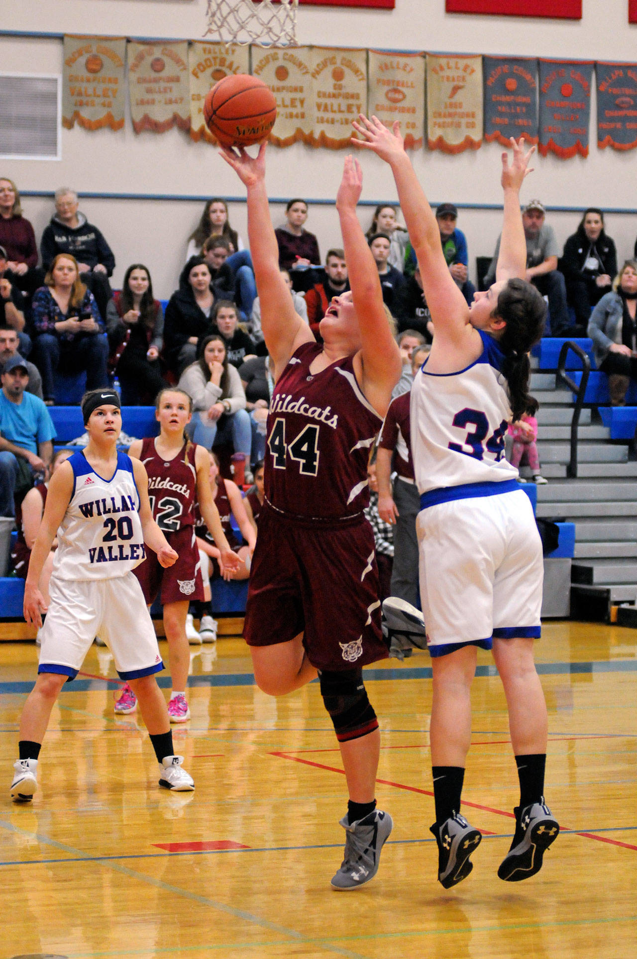 Ocosta’s Kristi Raffelson scores two of her 10 points during the second half of the Wildcats’ 43-40 win over Willapa Valley on Tuesday in Menlo. In her first game back from a knee injury, Raffelson scored six points and two assists in the Wildcats’ fourth-quarter rally. (Ryan Sparks | Grays Harbor News Group)
