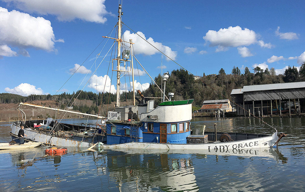 COURTESY DEPARTMENT OF ECOLOGY                                The Lady Grace fishing vessel sank in the Hoquiam River March 2, 2018, on the west side of the river north of the Hum Dinger restaurant. The owner of this vessel and one other has been fined by the State Department of Ecology for the sinkings and related spill response and cleanup.