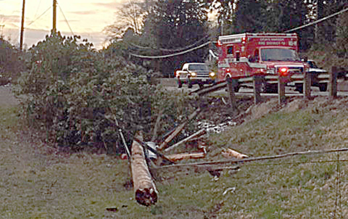COURTESY WASHINGTON STATE PATROL                                A power pole and tree were taken out by an SUV on eastbound Highway 12 in Central Park Tuesday afternoon, knocking out power to more than 7,000 PUD customers from Aberdeen to Montesano.