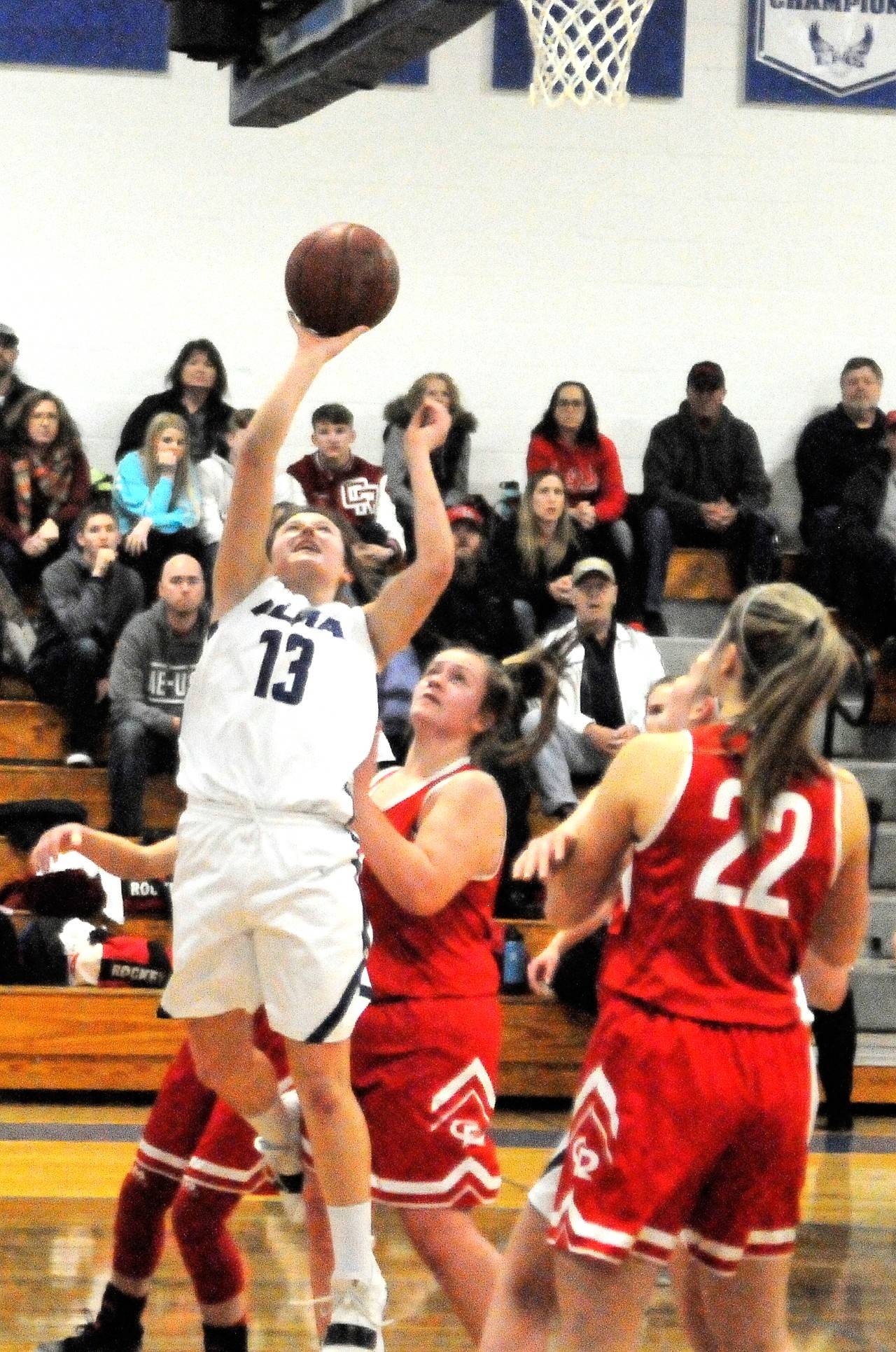 Kali Rambo hits a close-range shot in the first quarter against Castle Rock. Rambo had seven points in Elma’s 63-16 win in the opening round of the District IV tournament. (Hasani Grayson | Grays Harbor News Group)