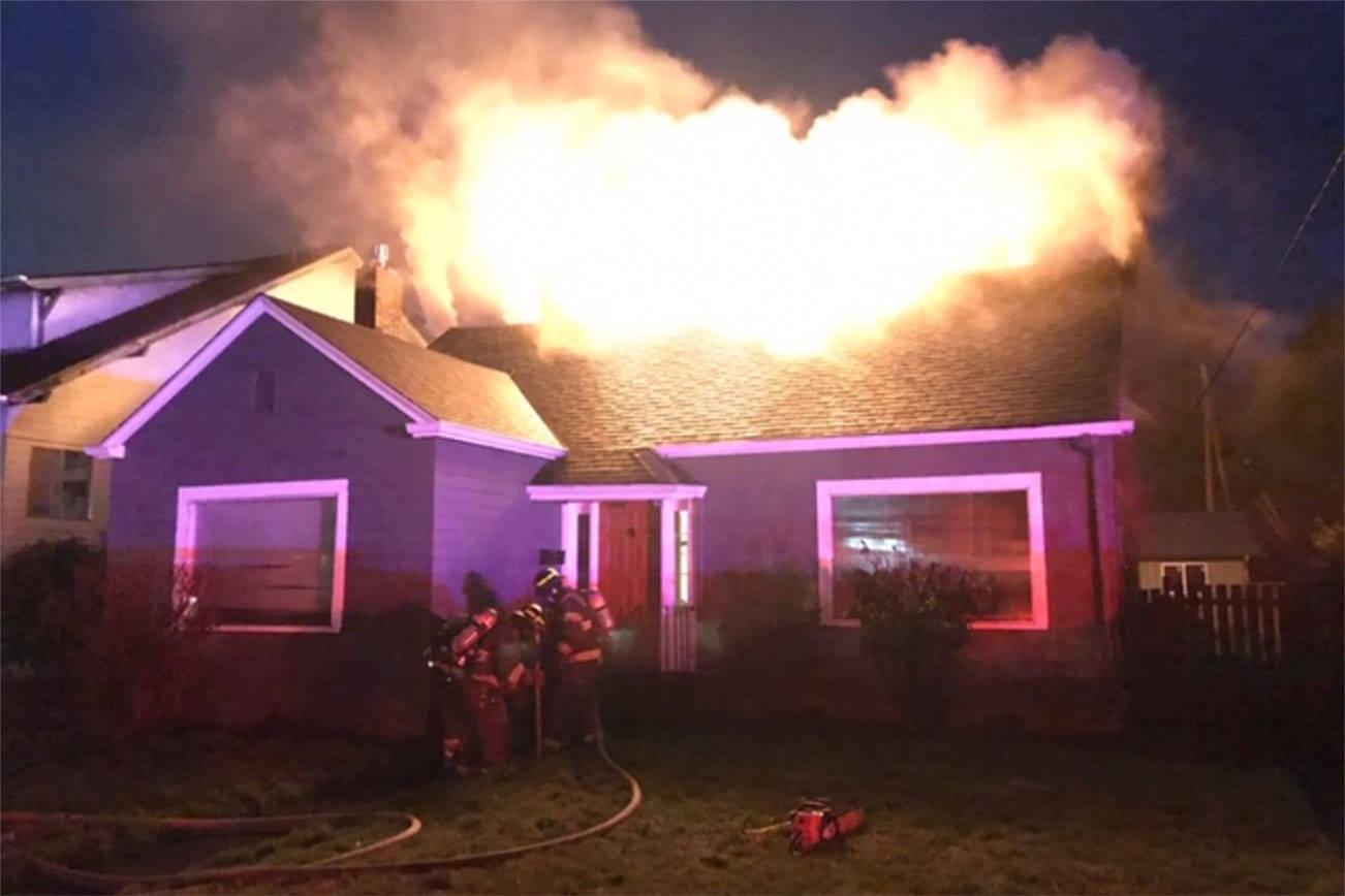(Courtesy Aberdeen Fire Department) Firefighters respond to an attic fire on Simpson Avenue in Aberdeen.